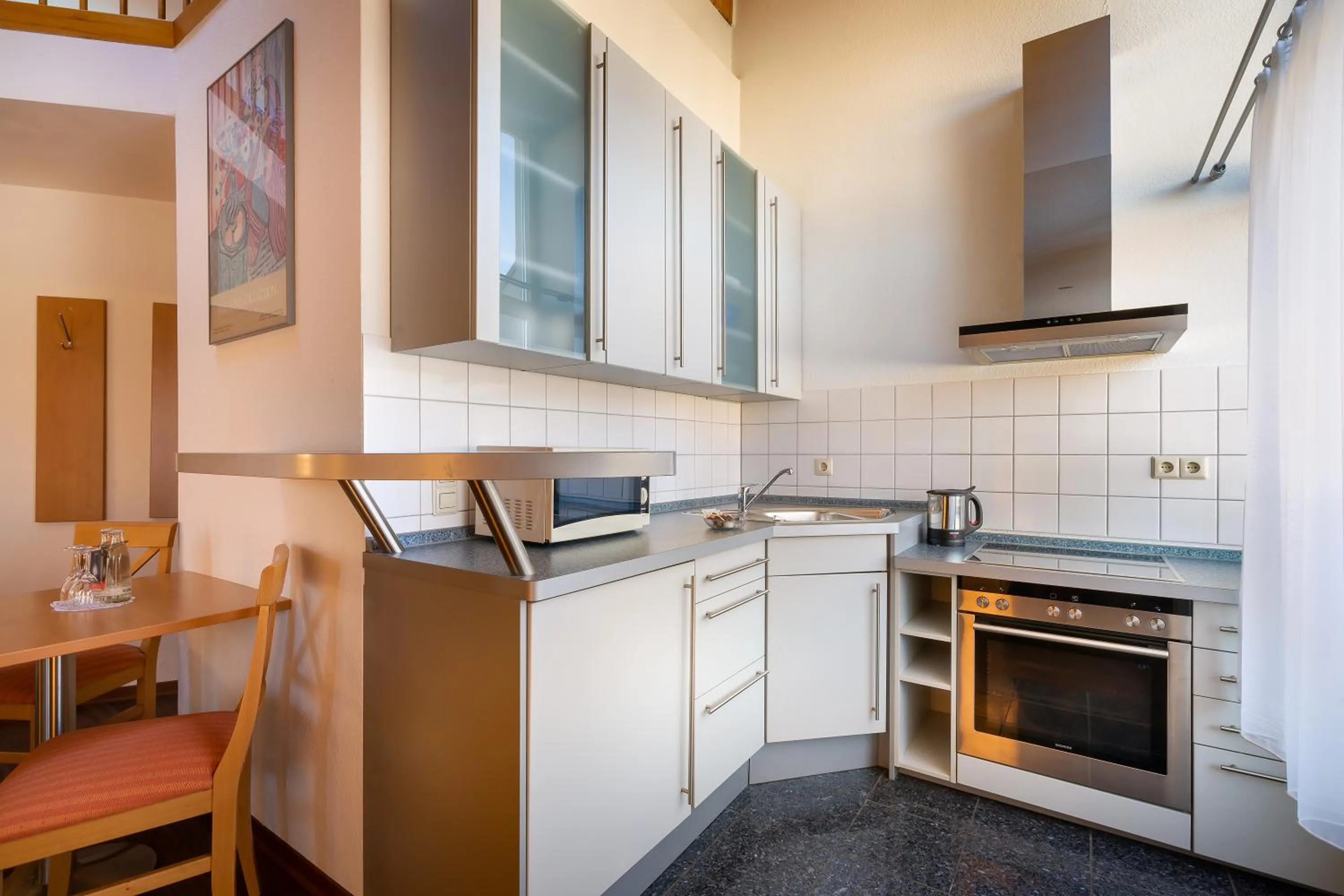 Kitchen or kitchenette in acora Karlsruhe Zentrum Living the City