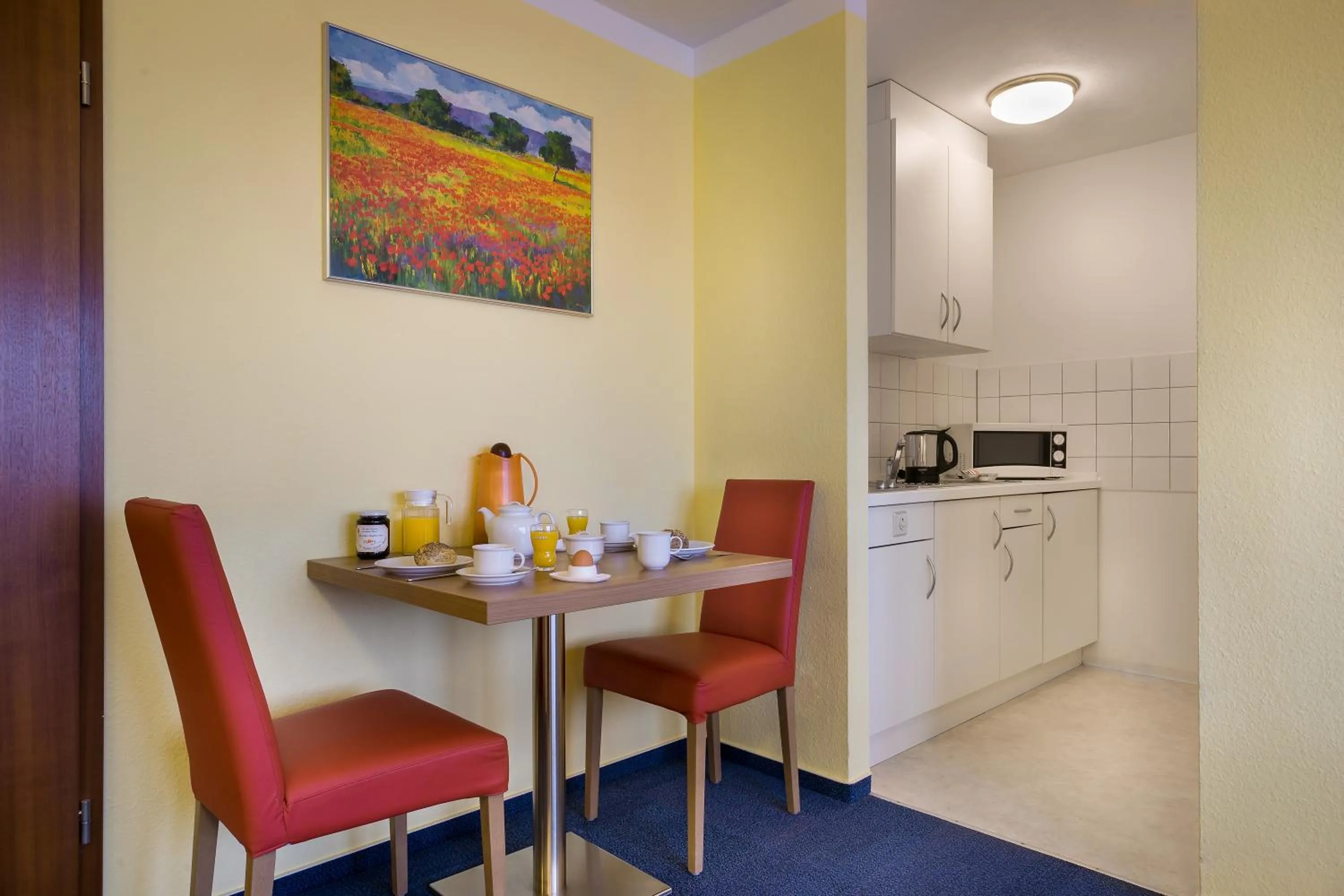 Kitchen or kitchenette in acora Karlsruhe Zentrum Living the City
