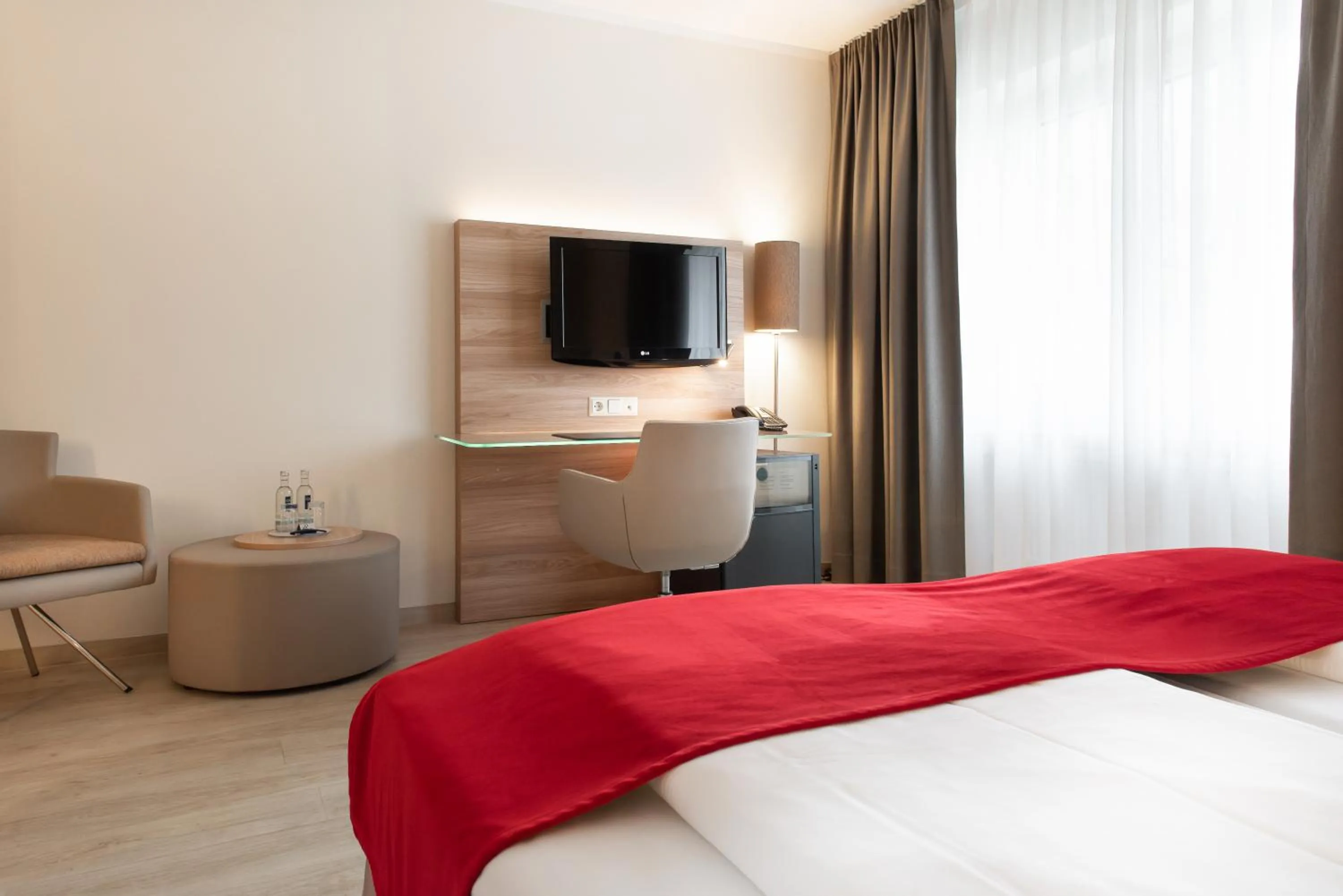 Bed in Hotel Königshof am Funkturm