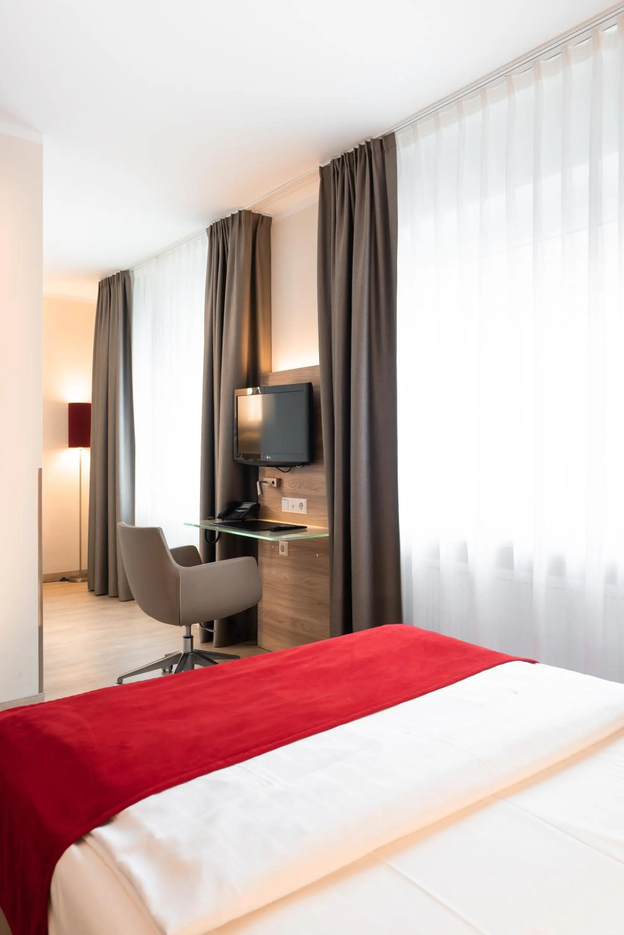 Bed in Hotel Königshof am Funkturm