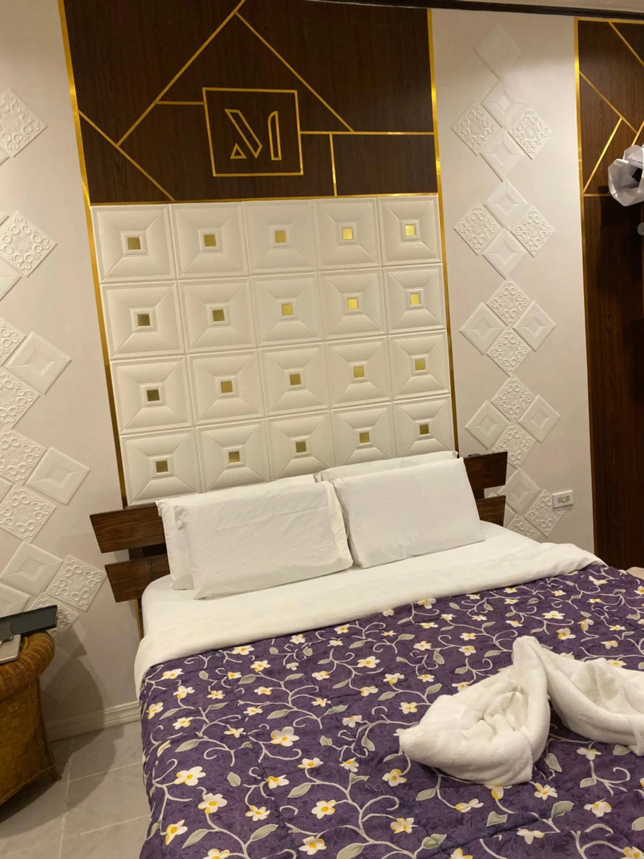 Bed in Monallan Boracay Hotel