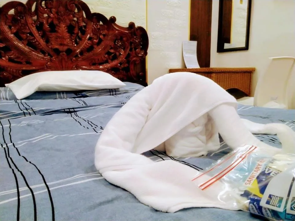 Bed in Monallan Boracay Hotel