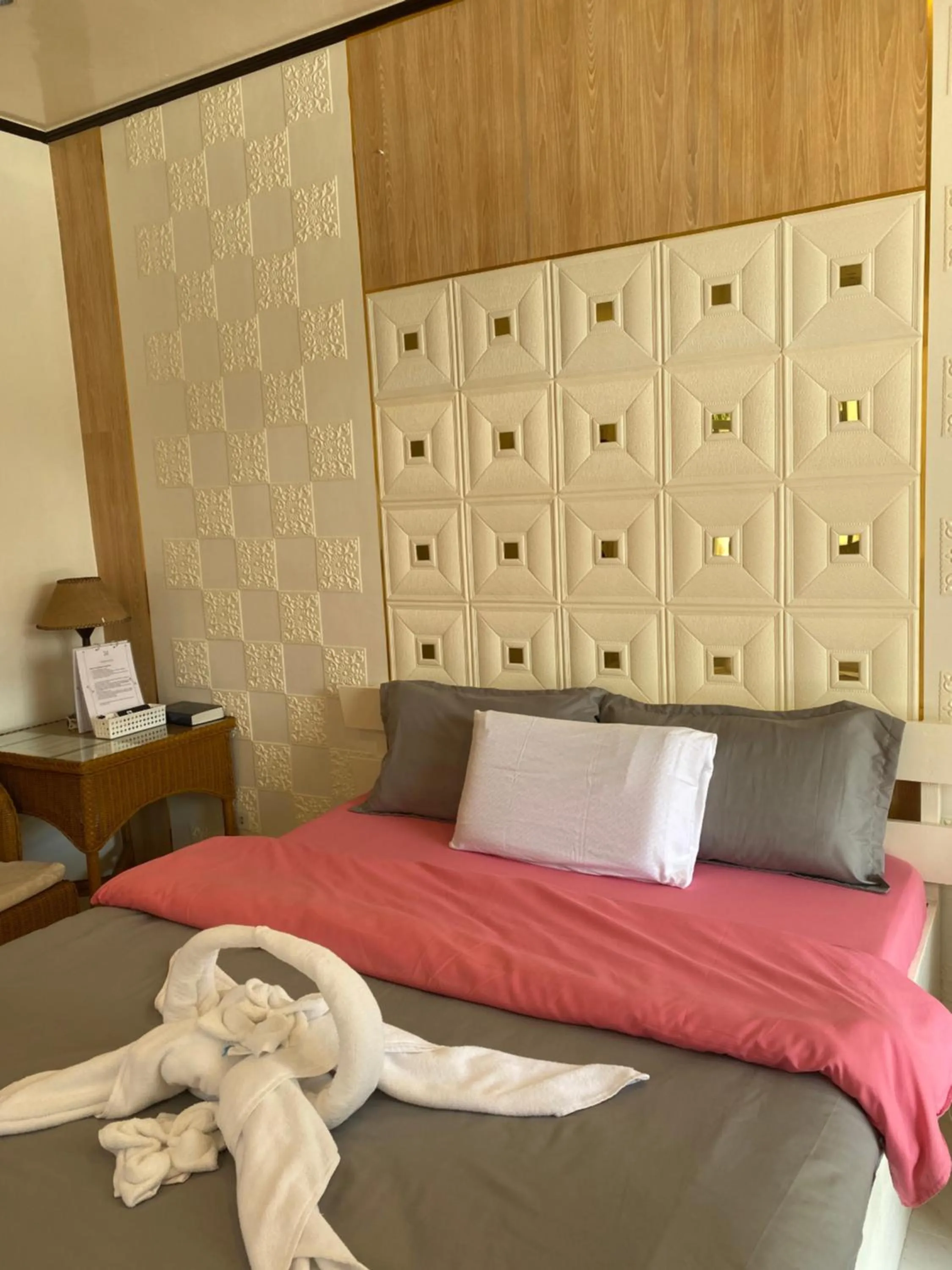 Bed in Monallan Boracay Hotel