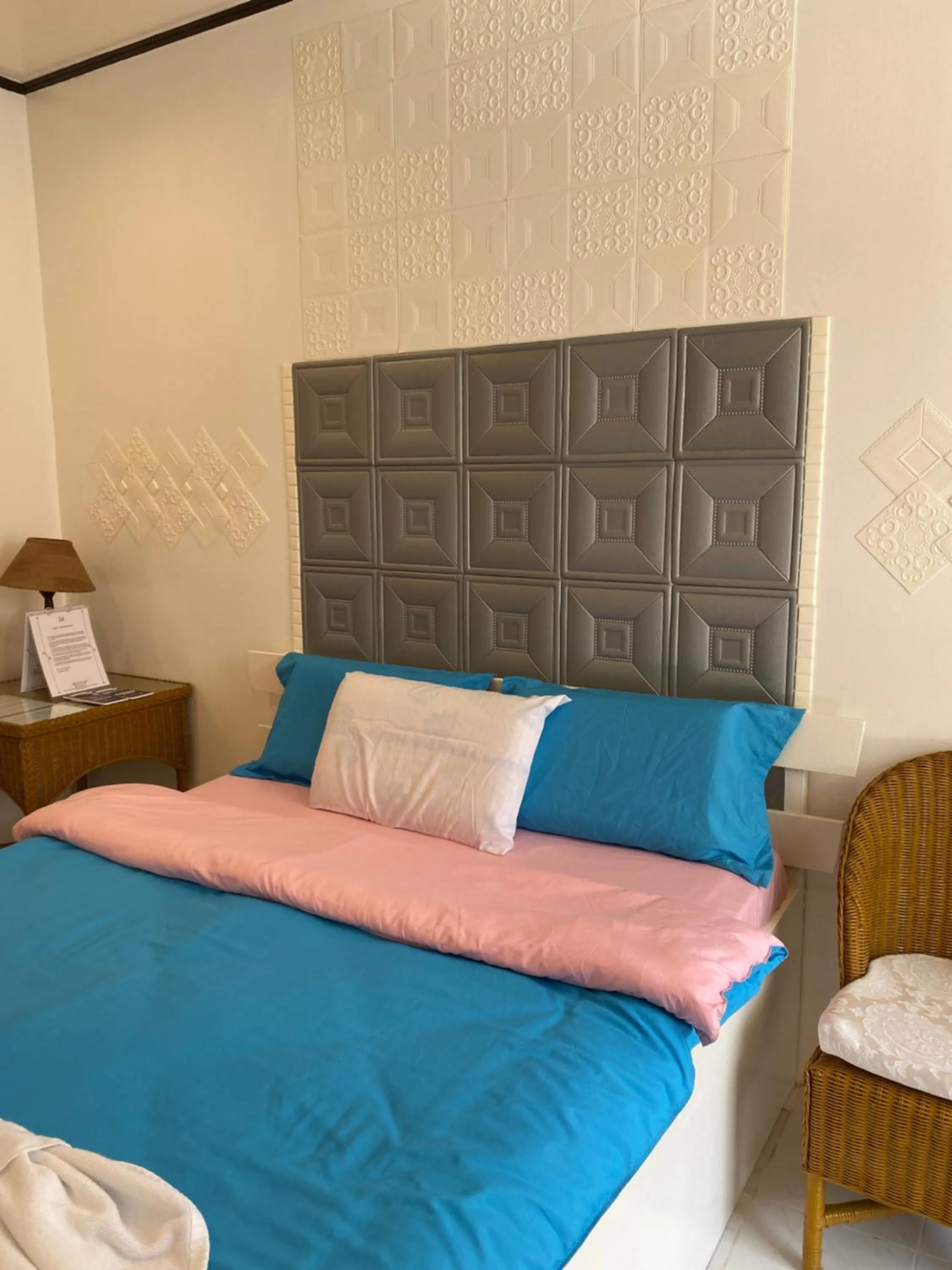 Bed in Monallan Boracay Hotel