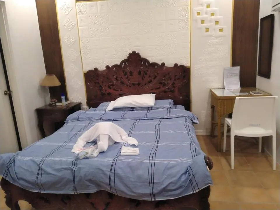 Bed in Monallan Boracay Hotel