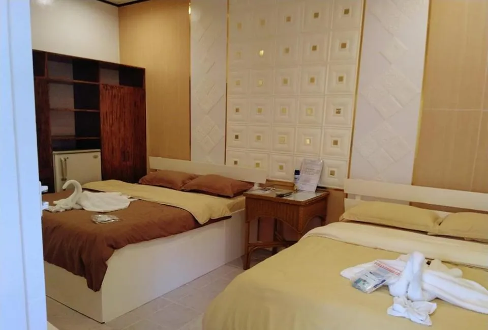 Bed in Monallan Boracay Hotel