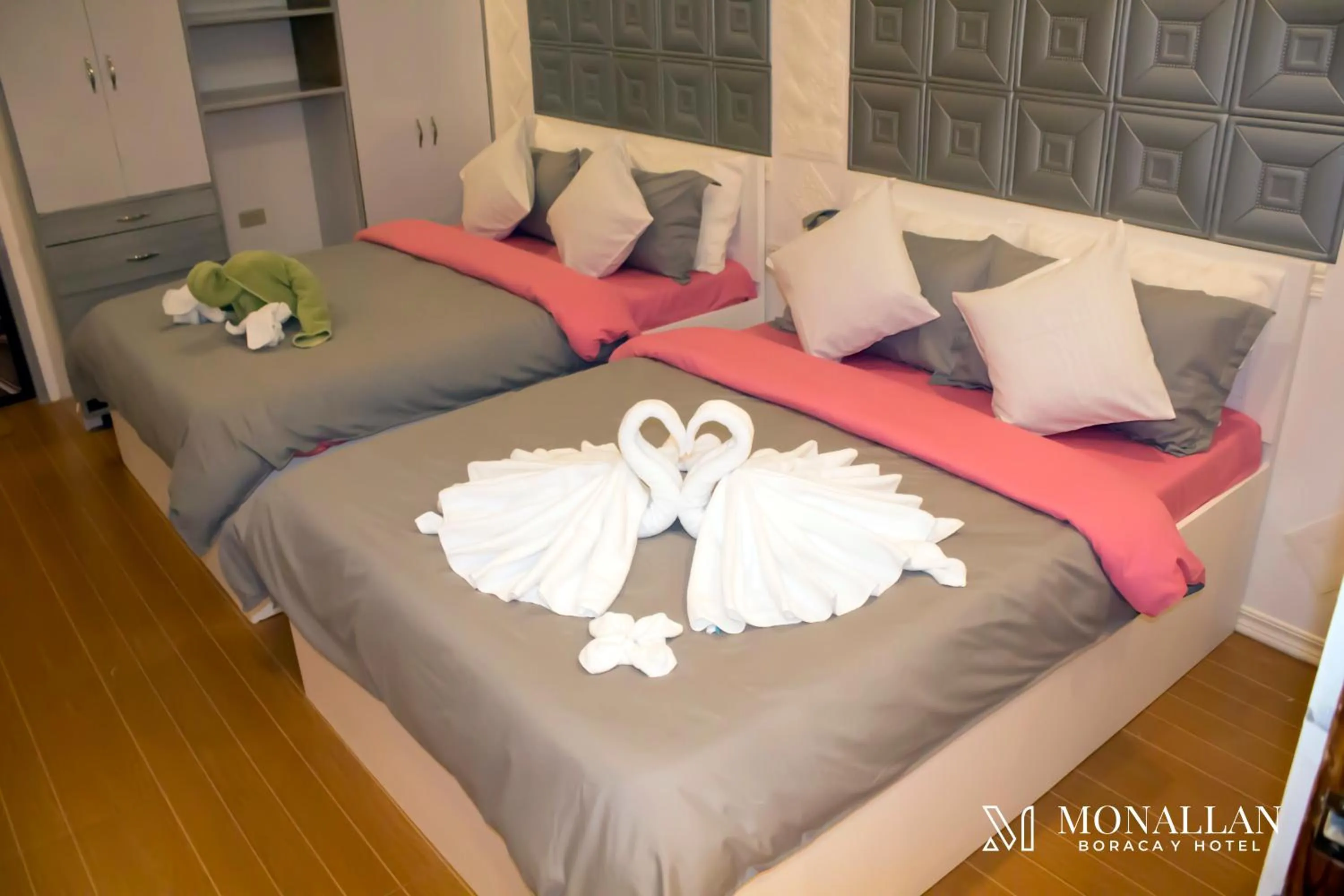 Bed in Monallan Boracay Hotel