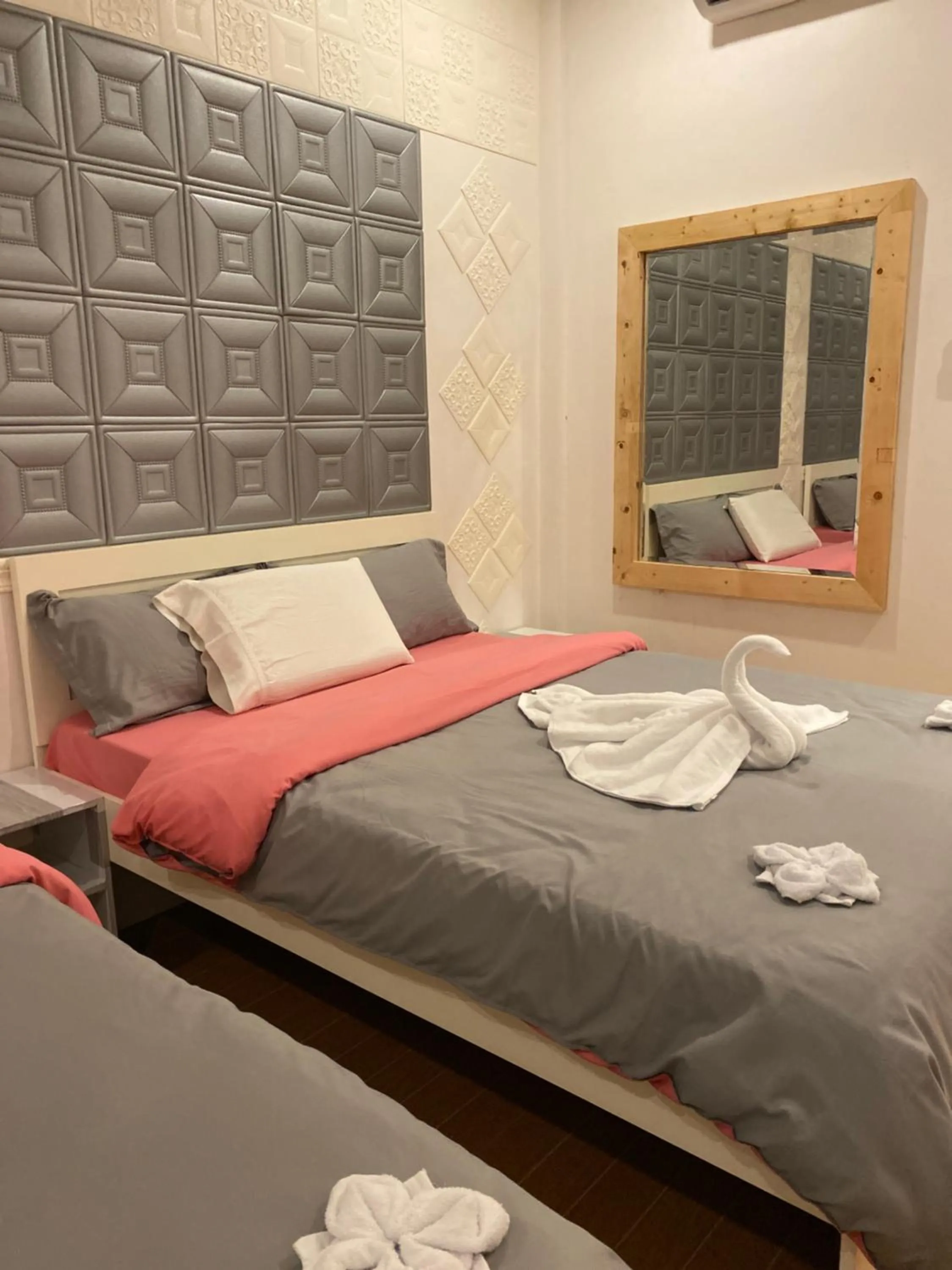 Bed in Monallan Boracay Hotel