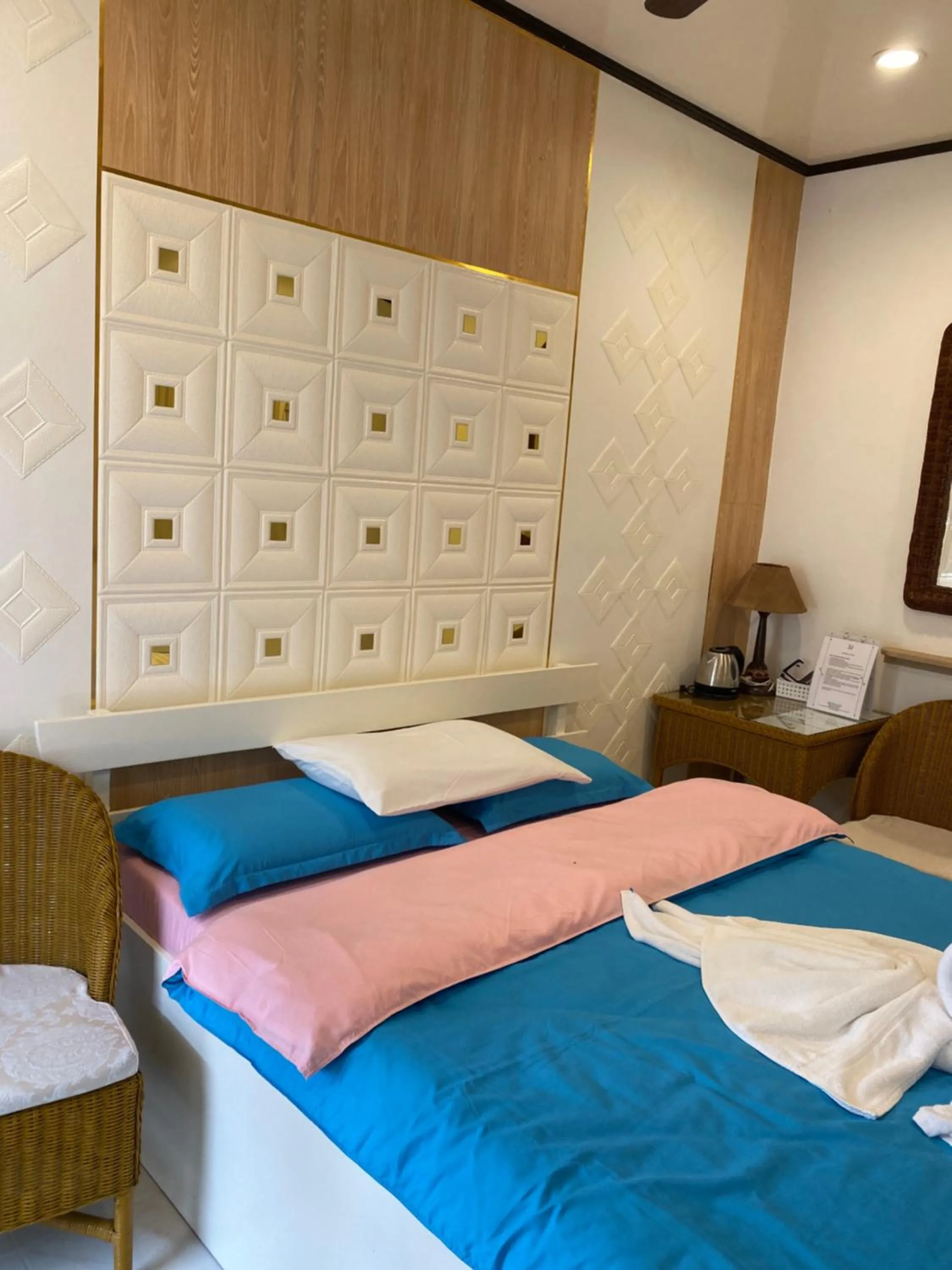 Bed in Monallan Boracay Hotel