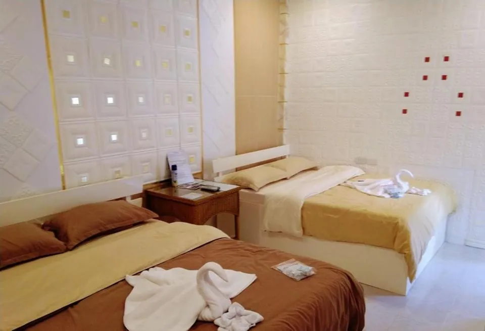 Bed in Monallan Boracay Hotel