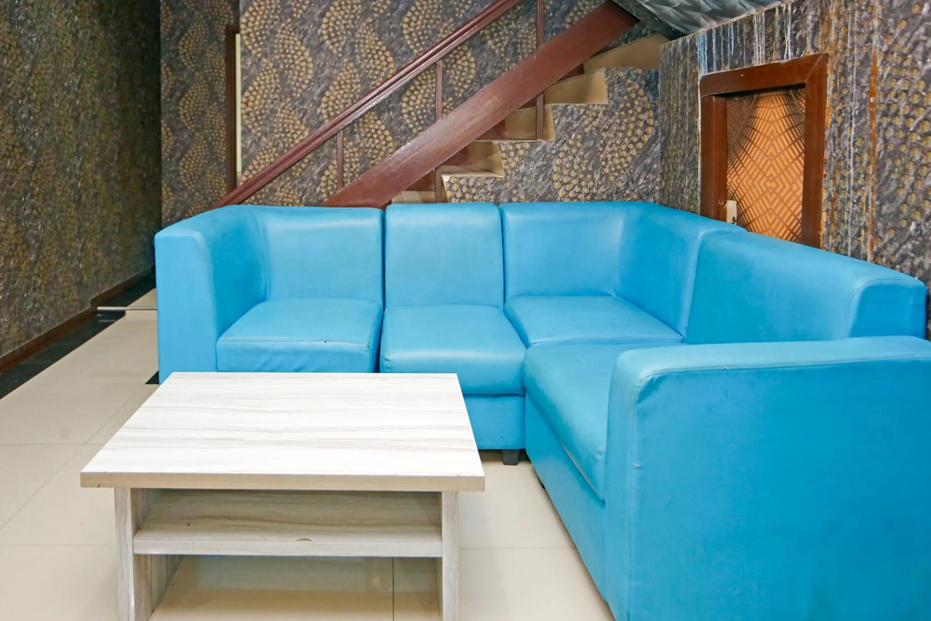 Seating area in Hotel O Bekasi Near Mall Lippo Cikarang Formerly Hotel Addictk