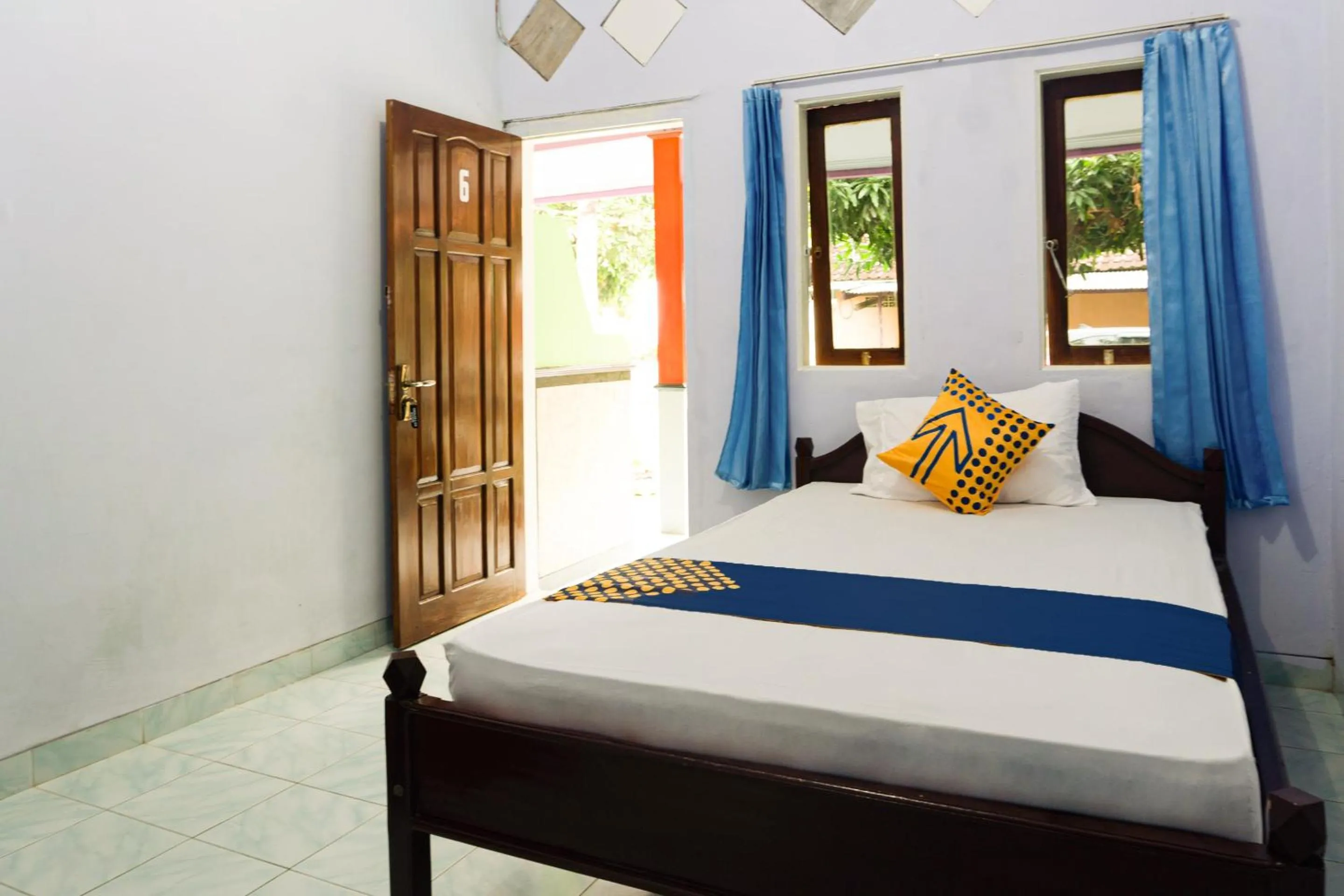 Bedroom, Bed in Hotel O Griya Ketapang