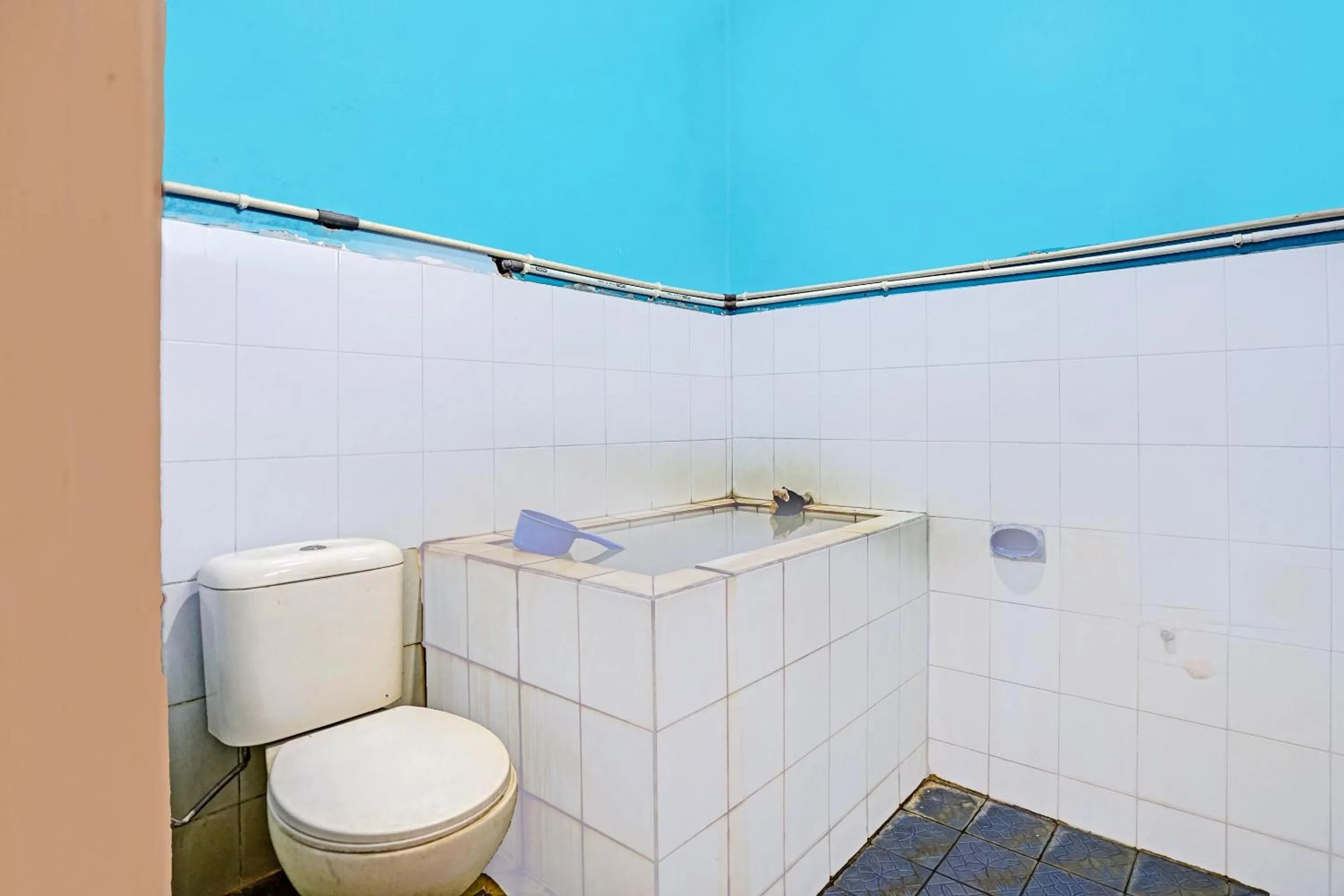 Bathroom in OYO 3205 Penginapan Mikial Ismi Kayuagung Syariah