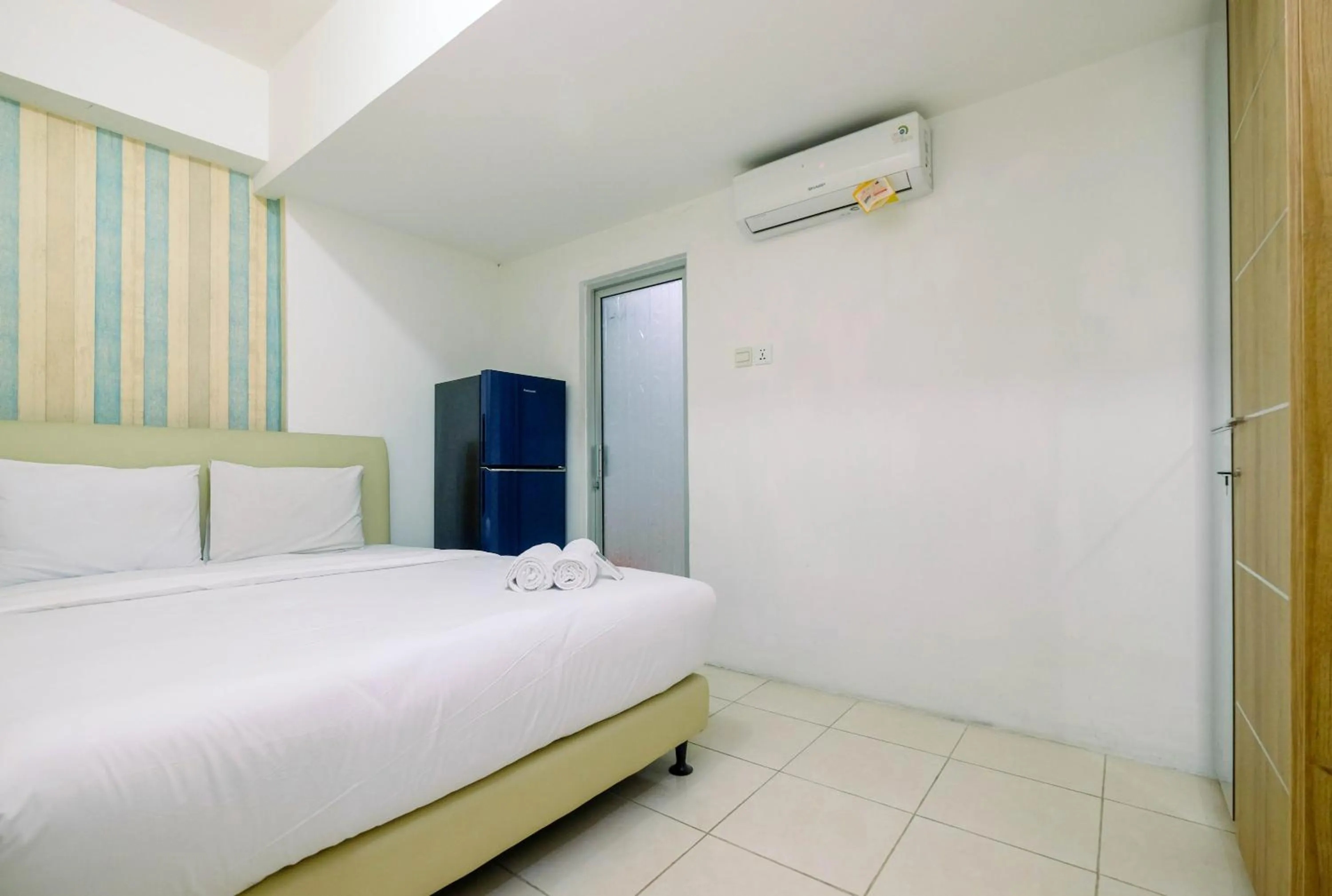 Bedroom, Bed in Best Price 1BR Apartment at Teluk Intan By Travelio