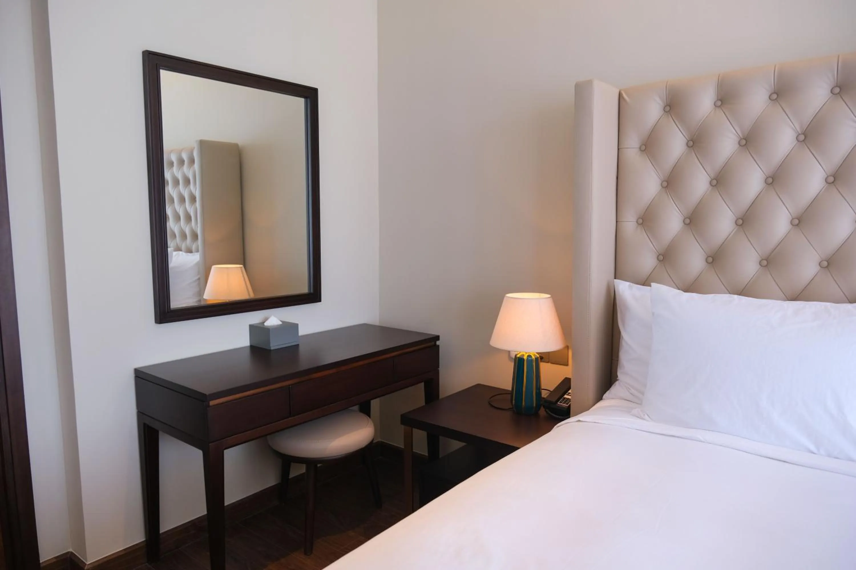 Bed in Wyndham Sky Lake Resort and Villas