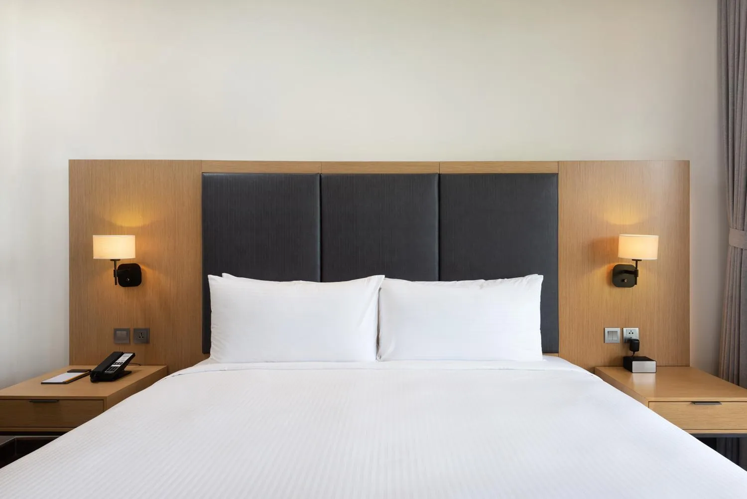 Bed in Wyndham Sky Lake Resort and Villas