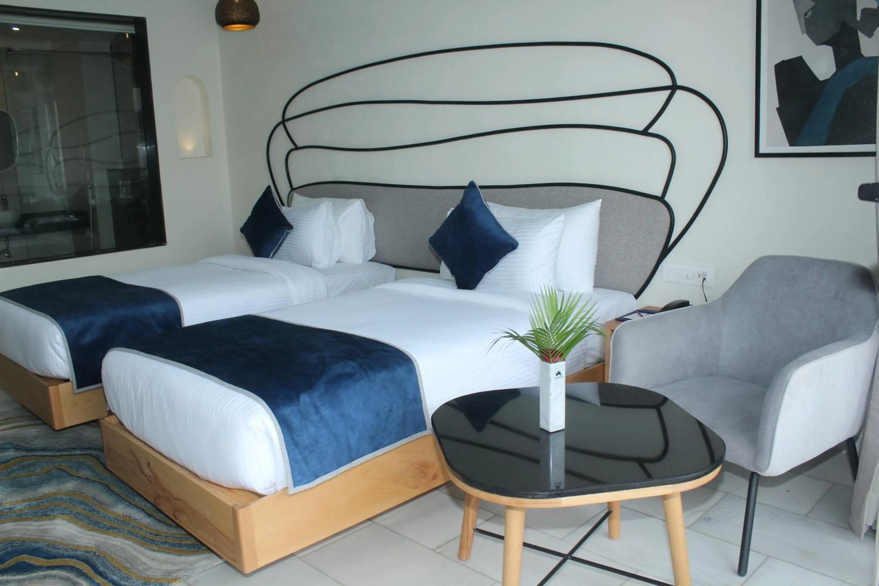 Bed in Ramee Royal Resort & Spa - Udaipur