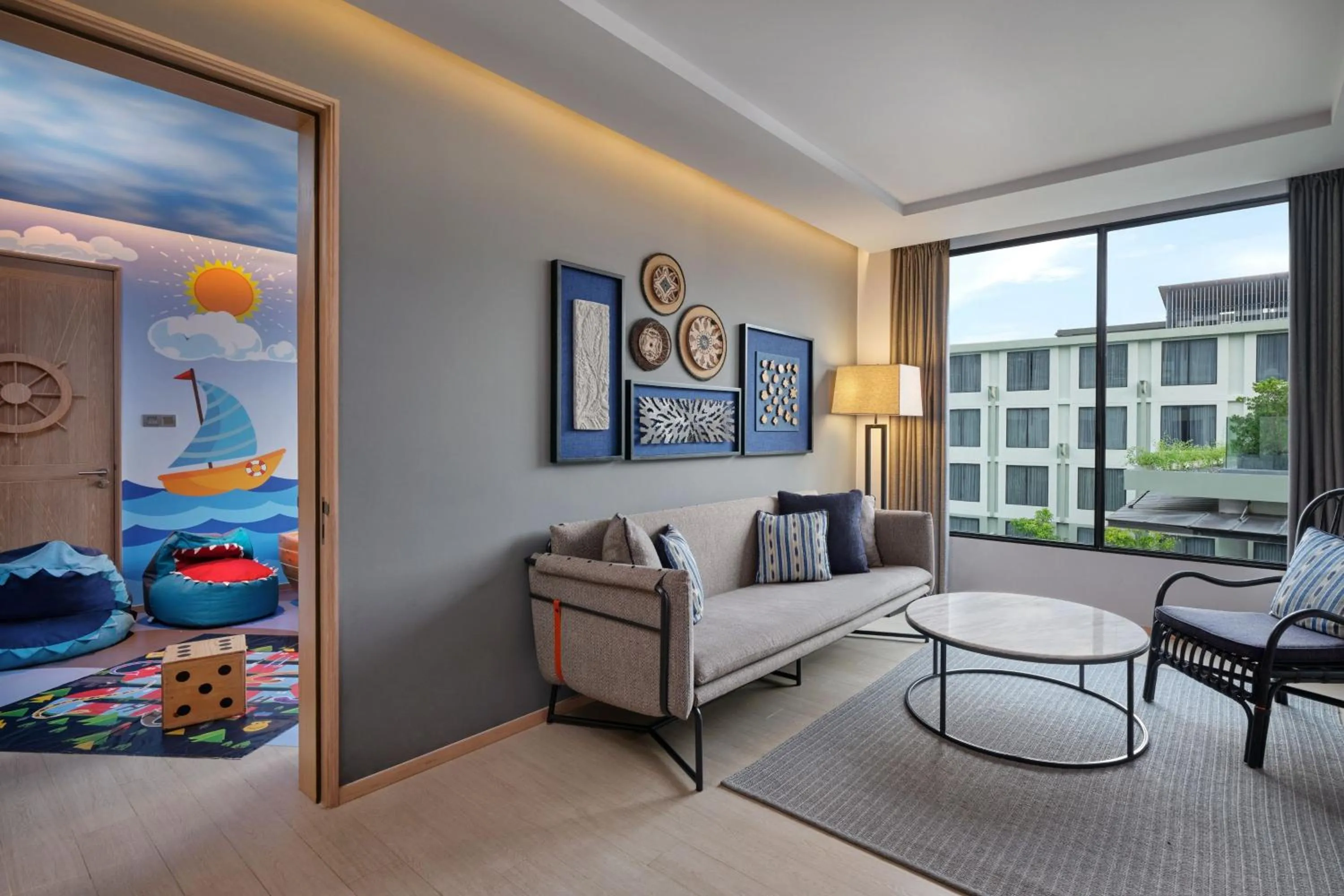 Living room in Four Points by Sheraton Phuket Patong Beach Resort