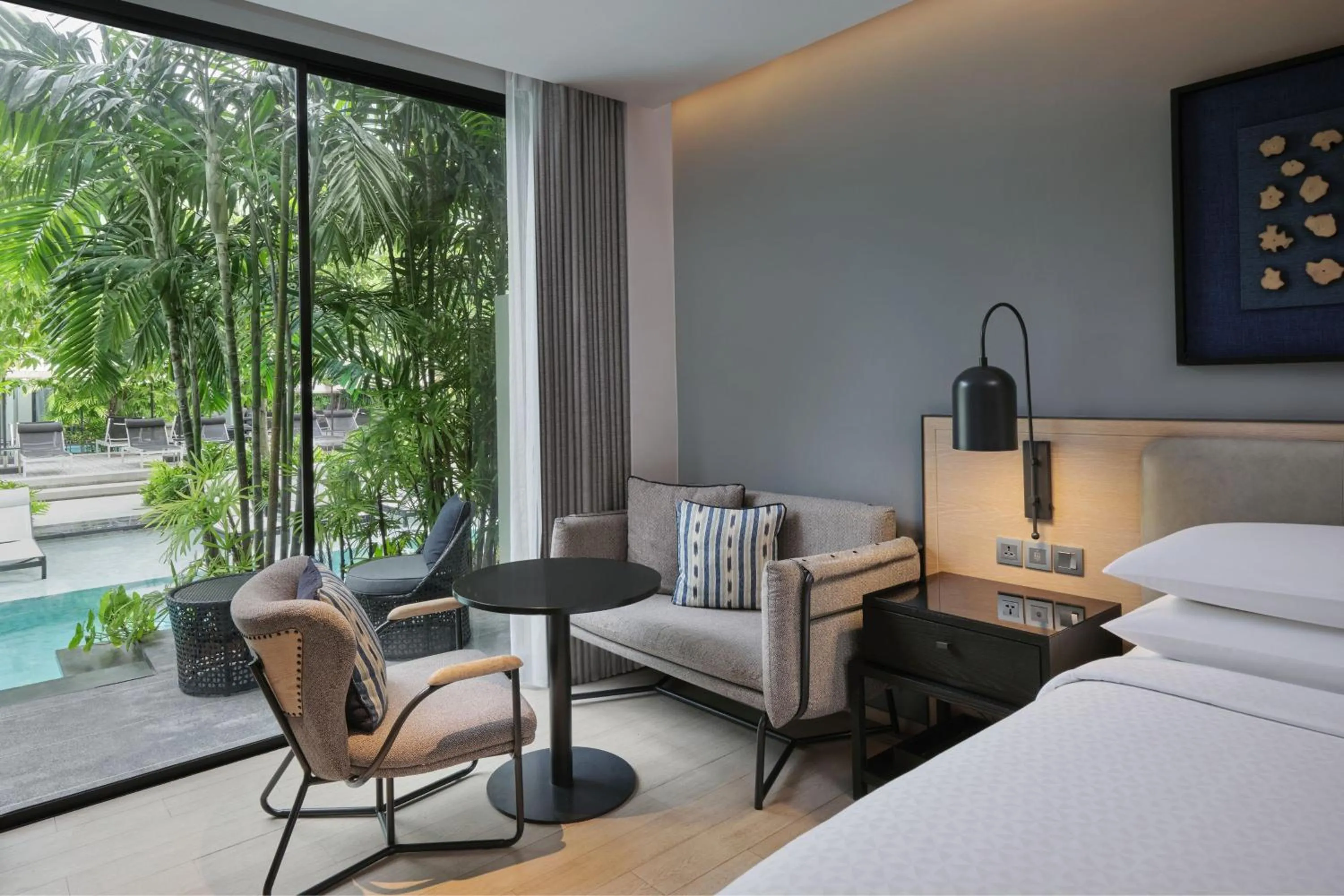 Swimming pool, Bed in Four Points by Sheraton Phuket Patong Beach Resort