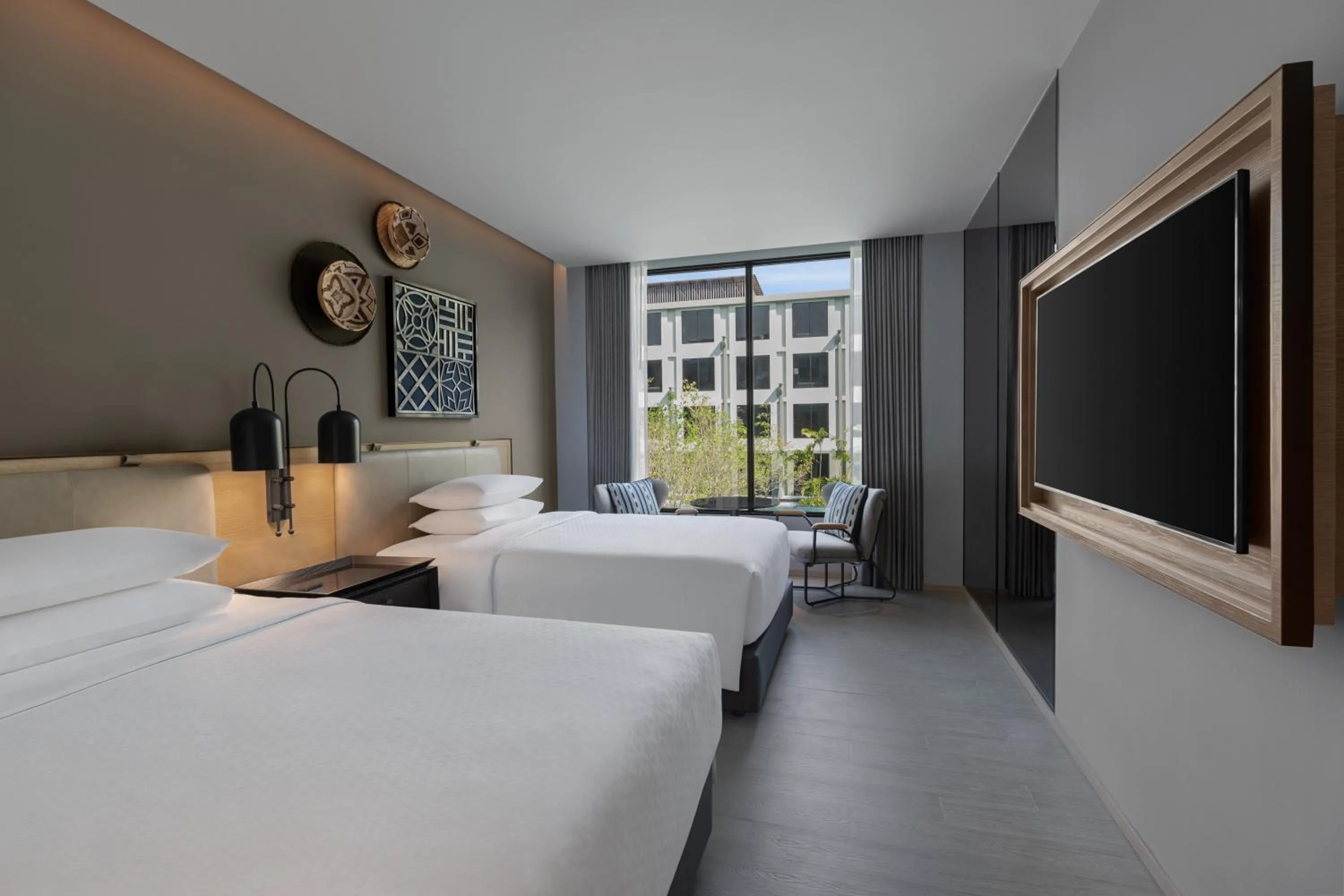 Bed in Four Points by Sheraton Phuket Patong Beach Resort