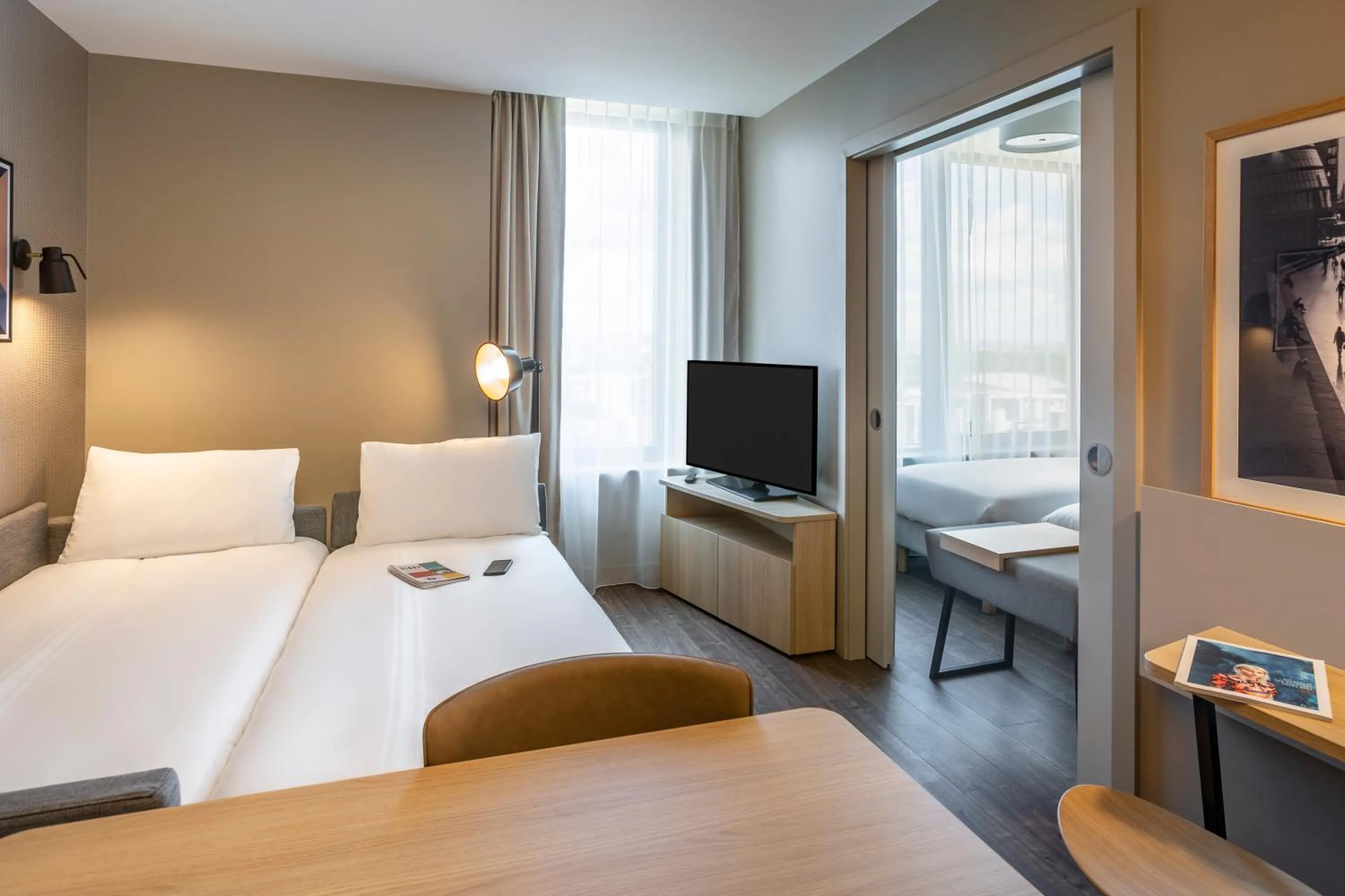 Living room, Bed in Aparthotel Adagio London Stratford