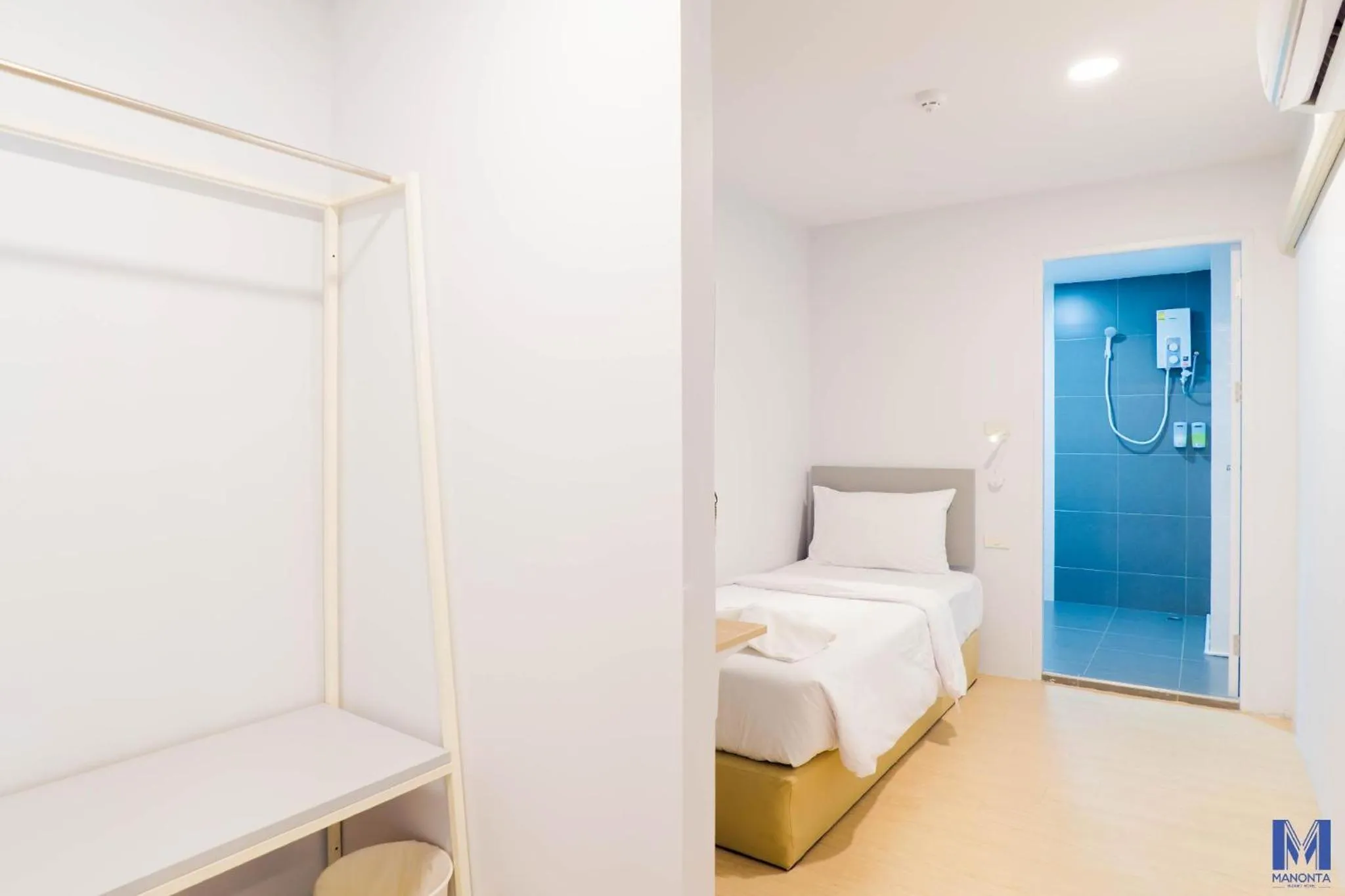 Bed in Manonta Budget Hotel