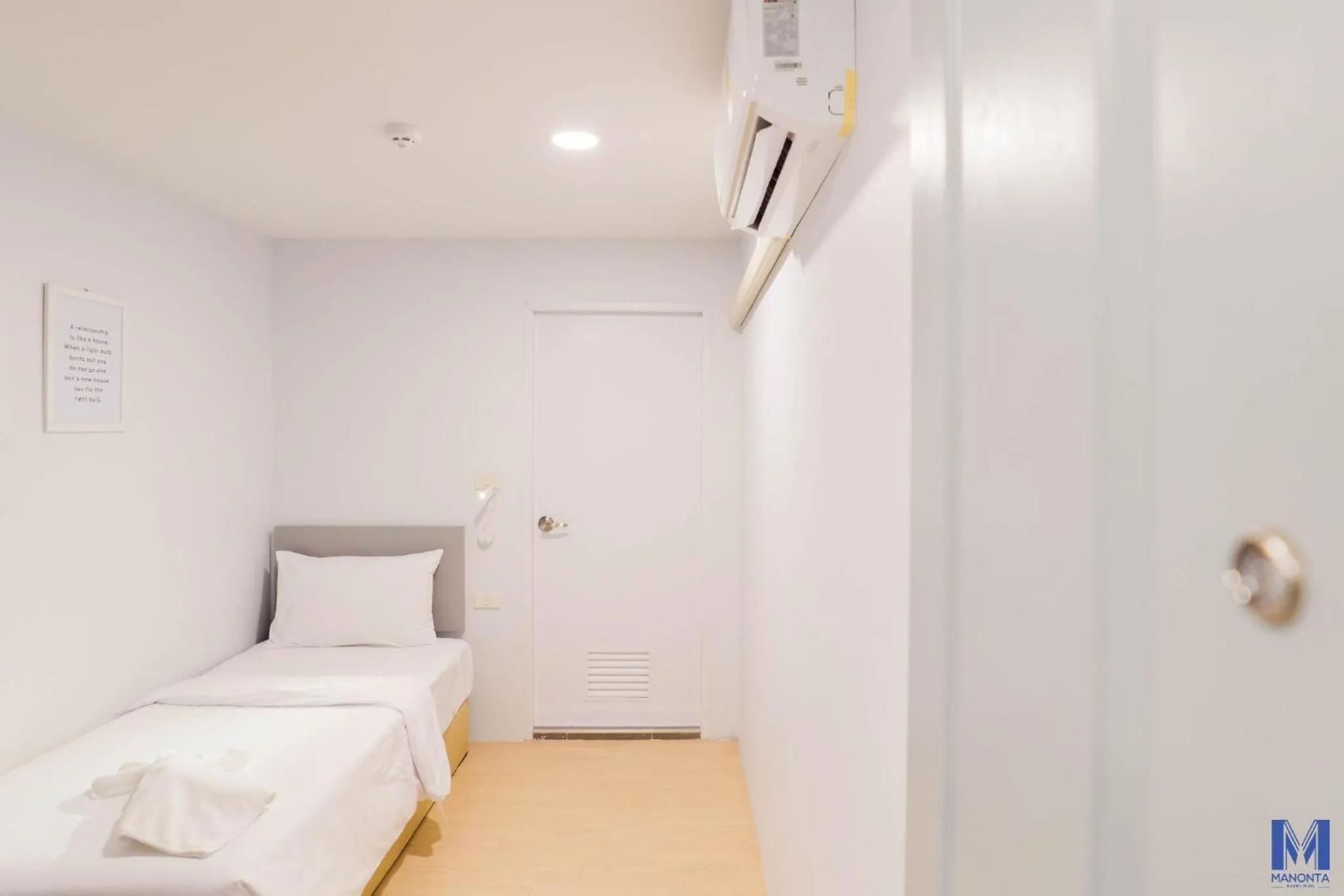 Bed in Manonta Budget Hotel