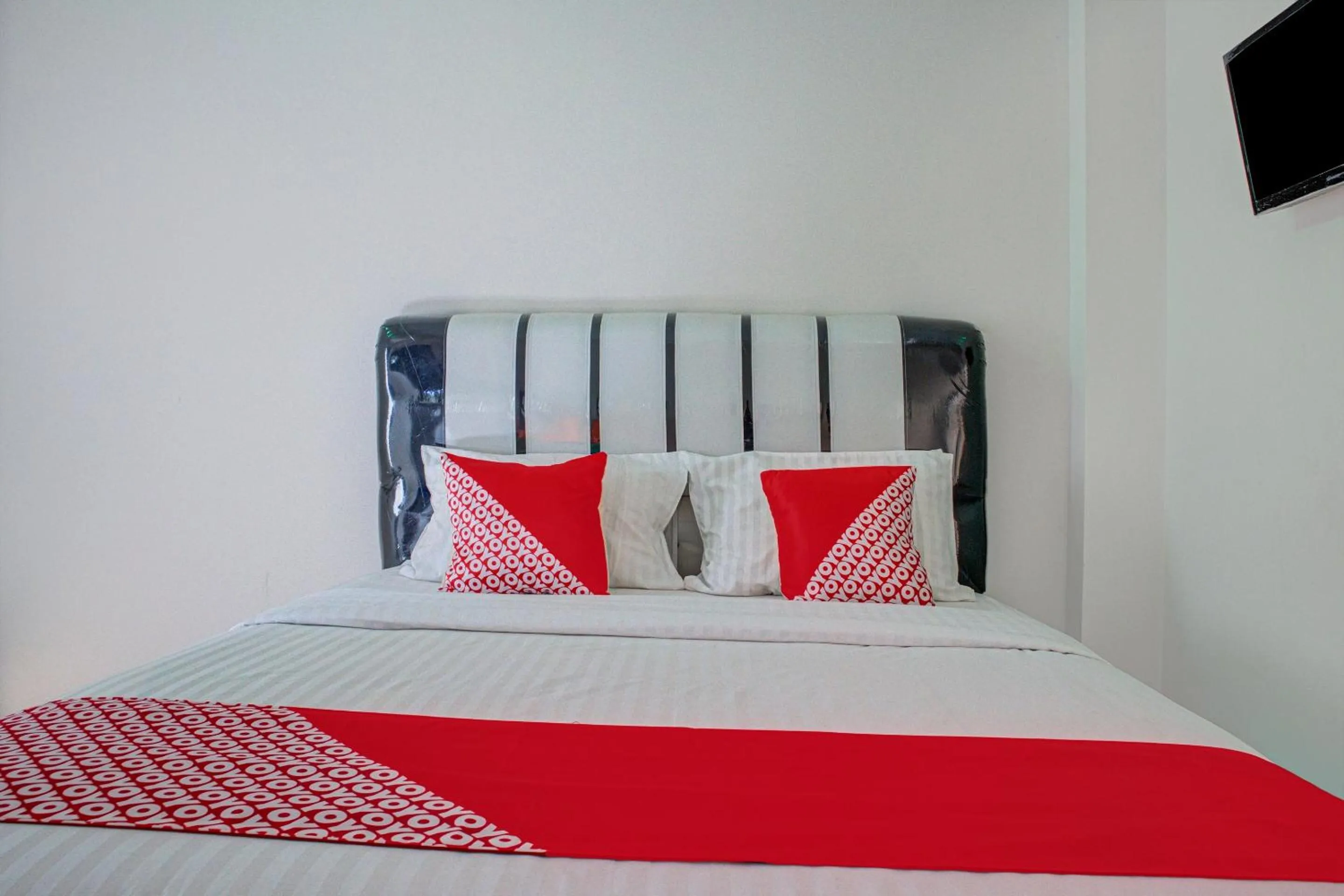 Bedroom in OYO 3266 Alifah Residence Syariah