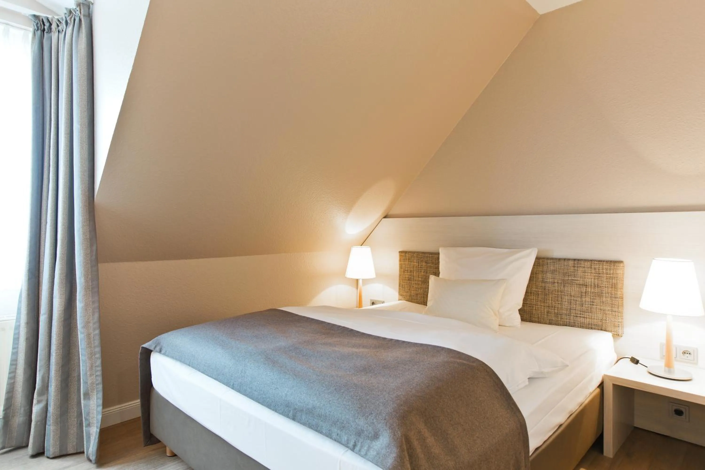 Bed in Best Western Plus Theodor Storm Hotel