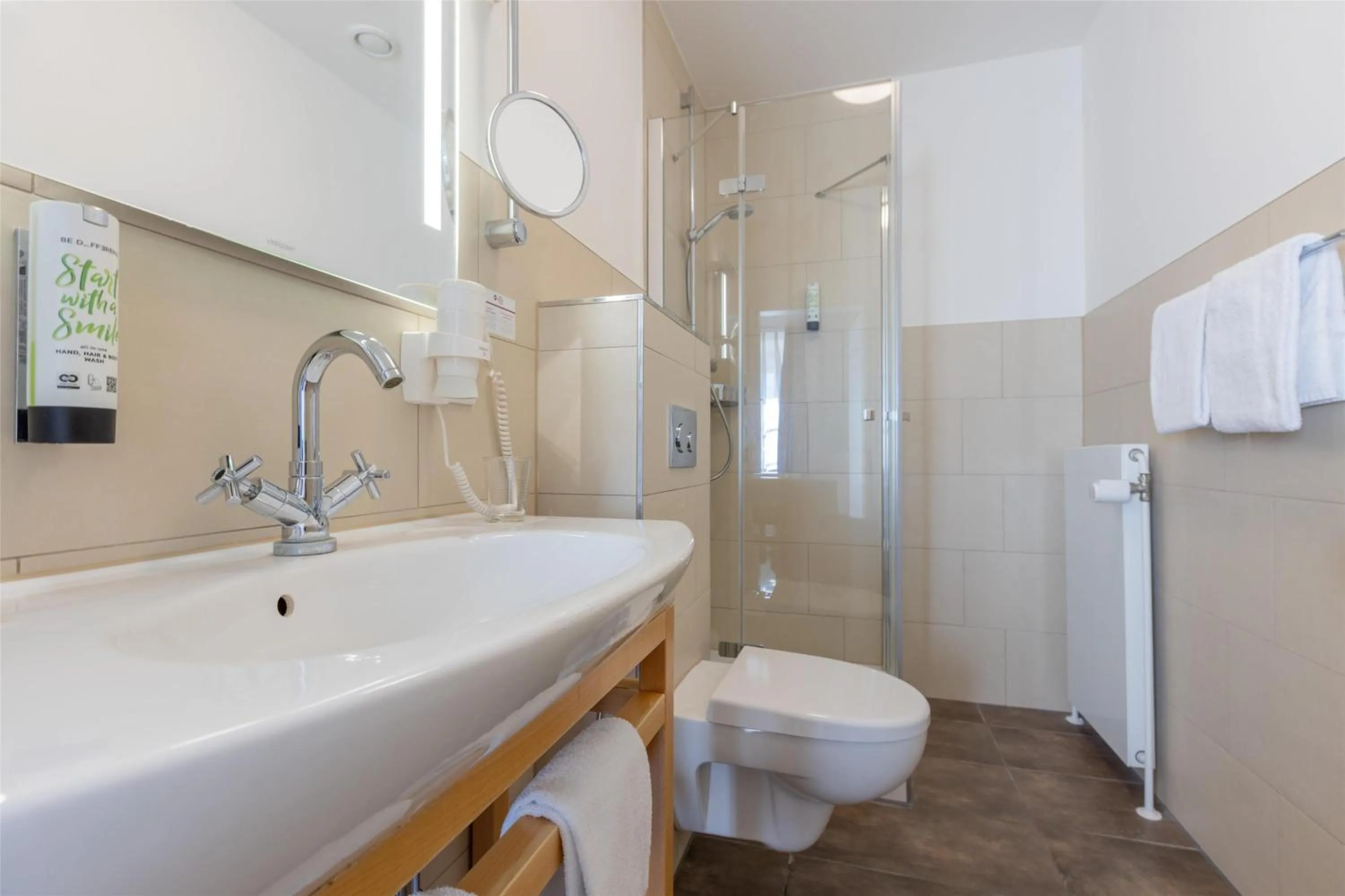 Bathroom in Best Western Plus Theodor Storm Hotel