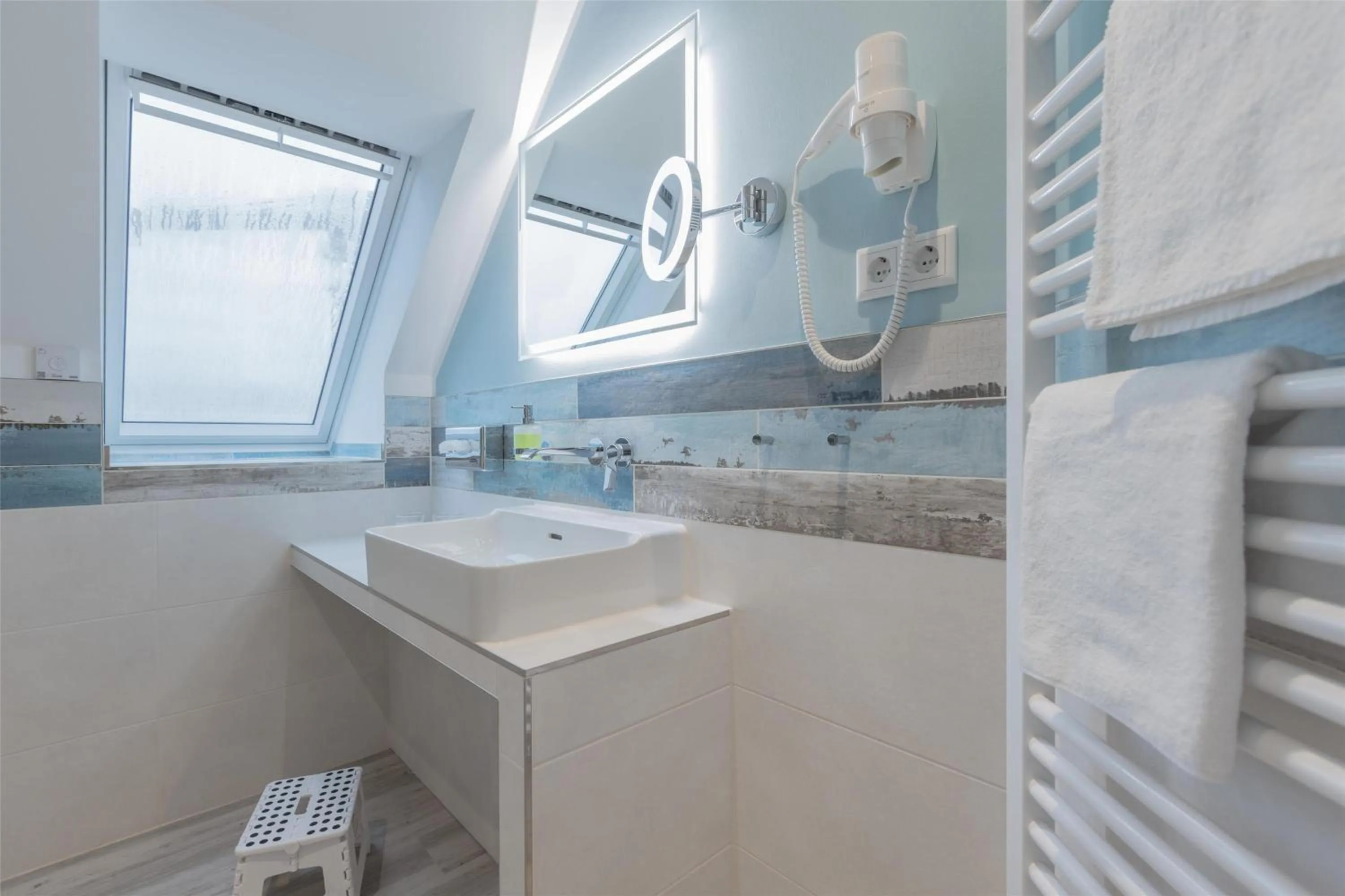 Bathroom in Best Western Plus Theodor Storm Hotel