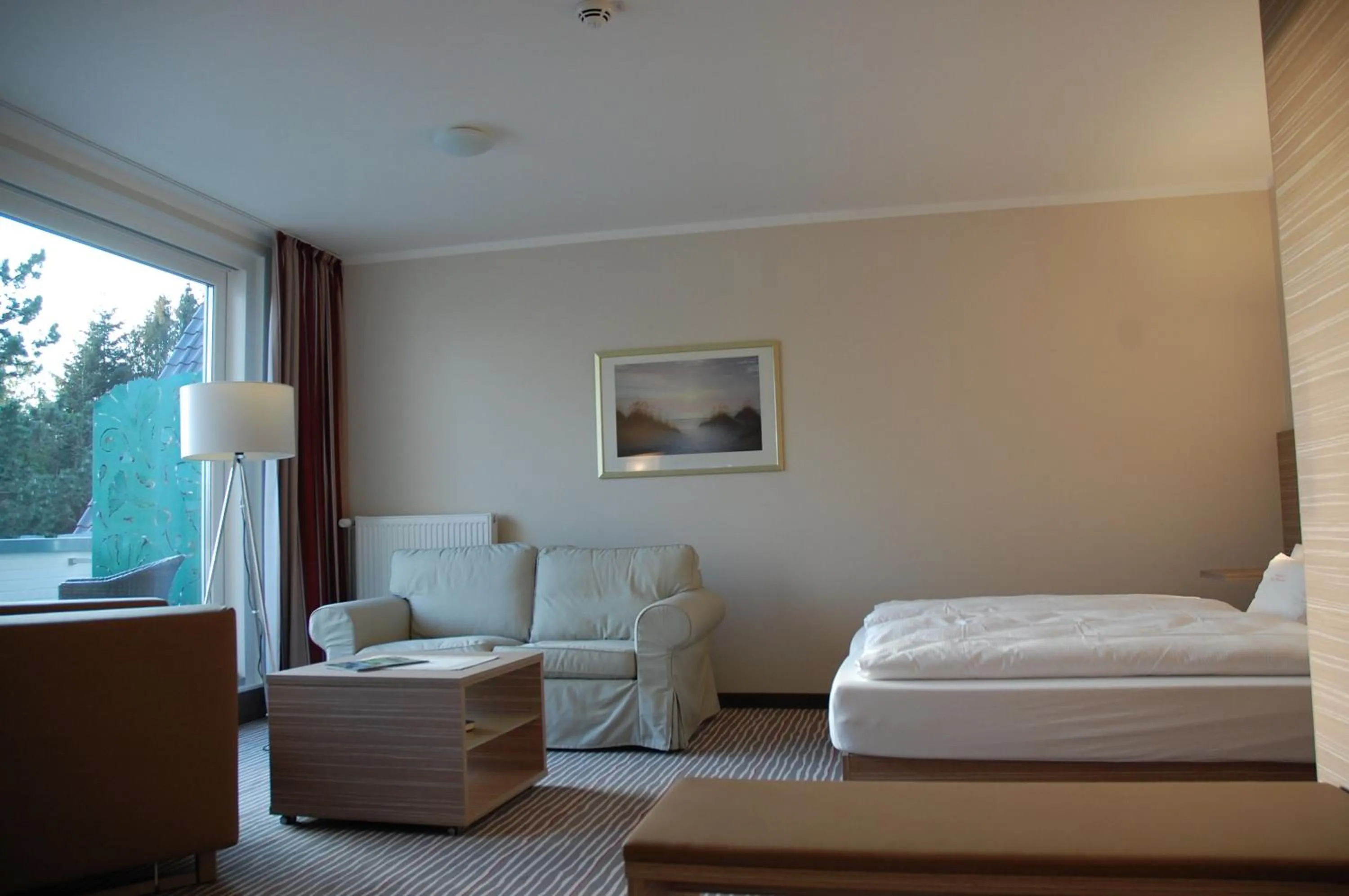 Seating area, Bed in Parkhotel Bad Bevensen ,ThermePlus