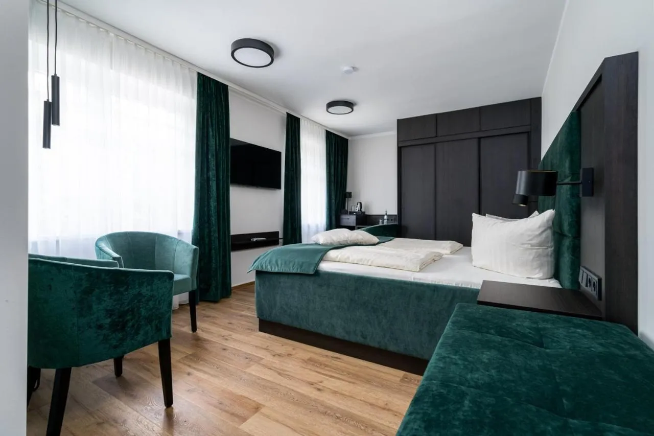 Photo of the whole room, Bed in Seehotel Ecktannen