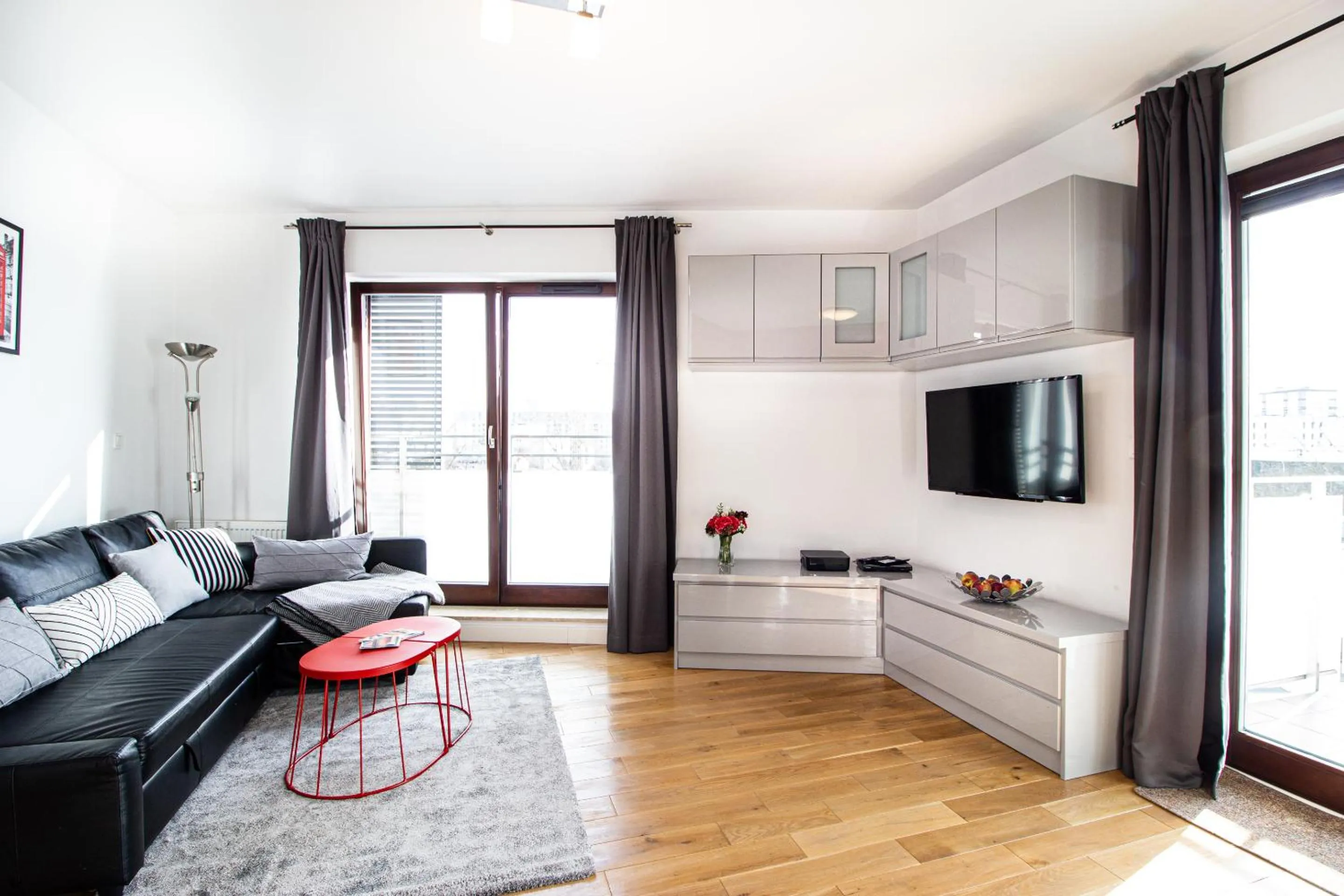 TV and multimedia in Krasińskiego Żoliborz Stylish Apartment by BookingHost