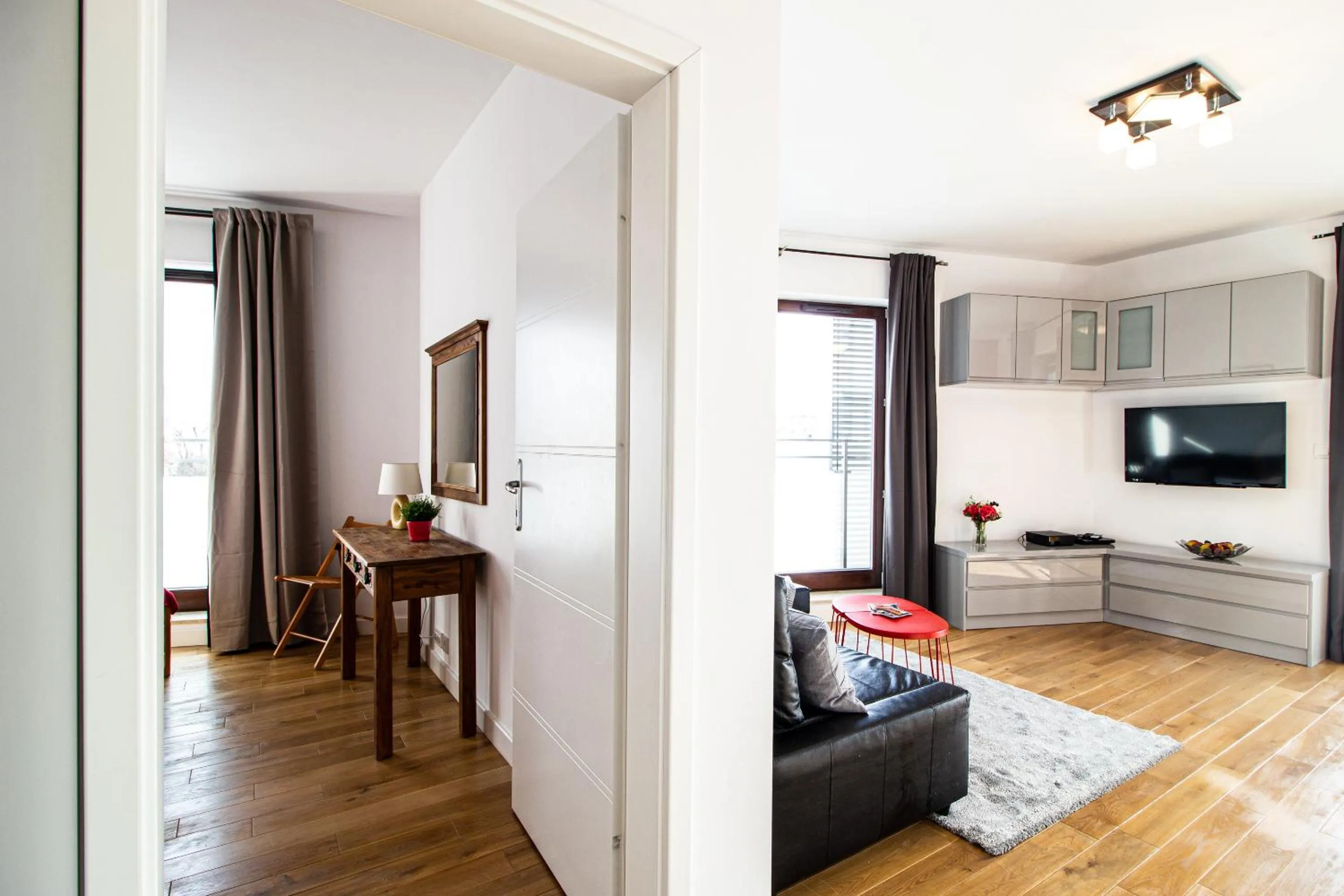 TV and multimedia in Krasińskiego Żoliborz Stylish Apartment by BookingHost