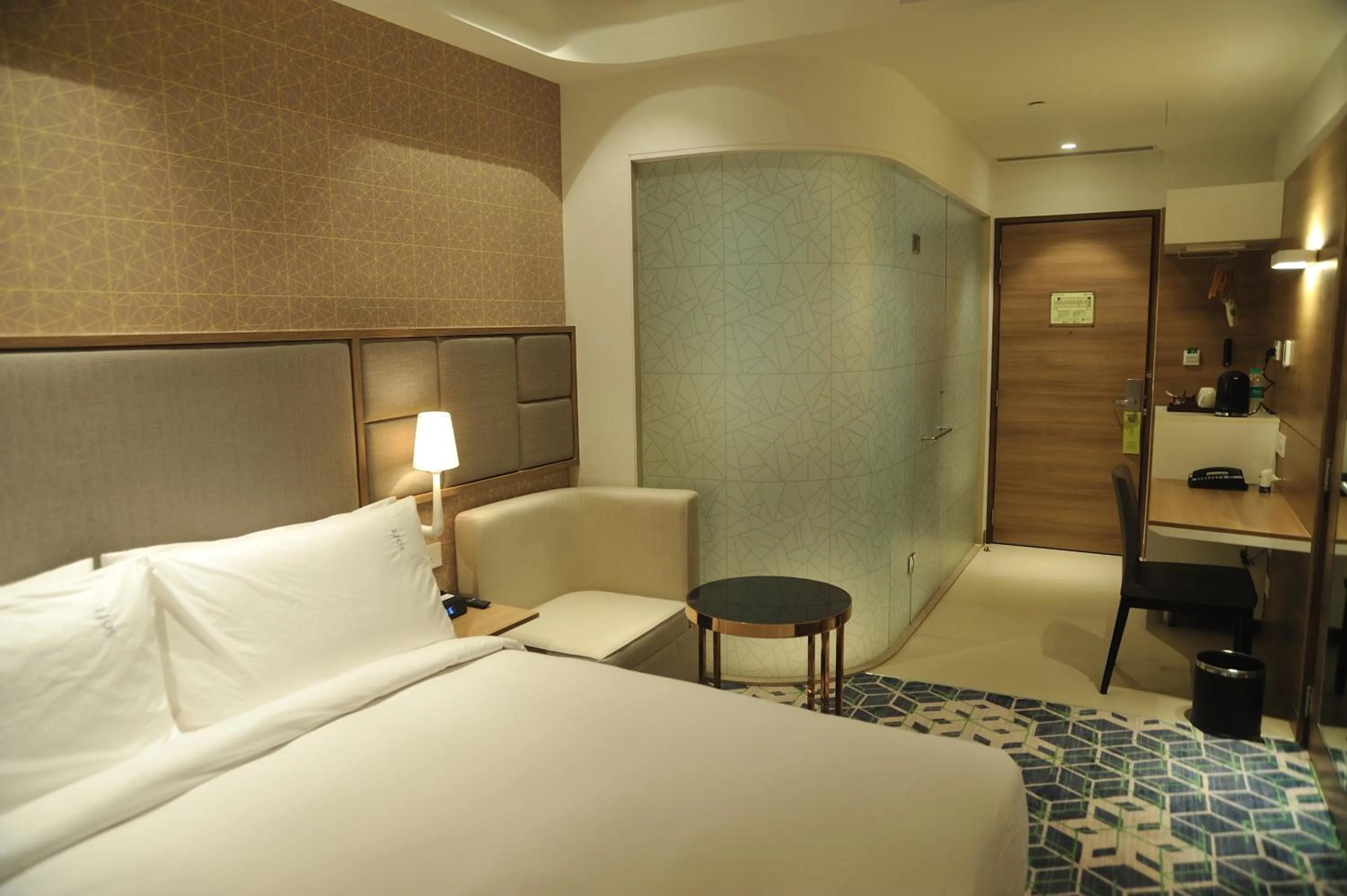 Photo of the whole room, Bed in Holiday Inn Gurugram Sector 90 by IHG