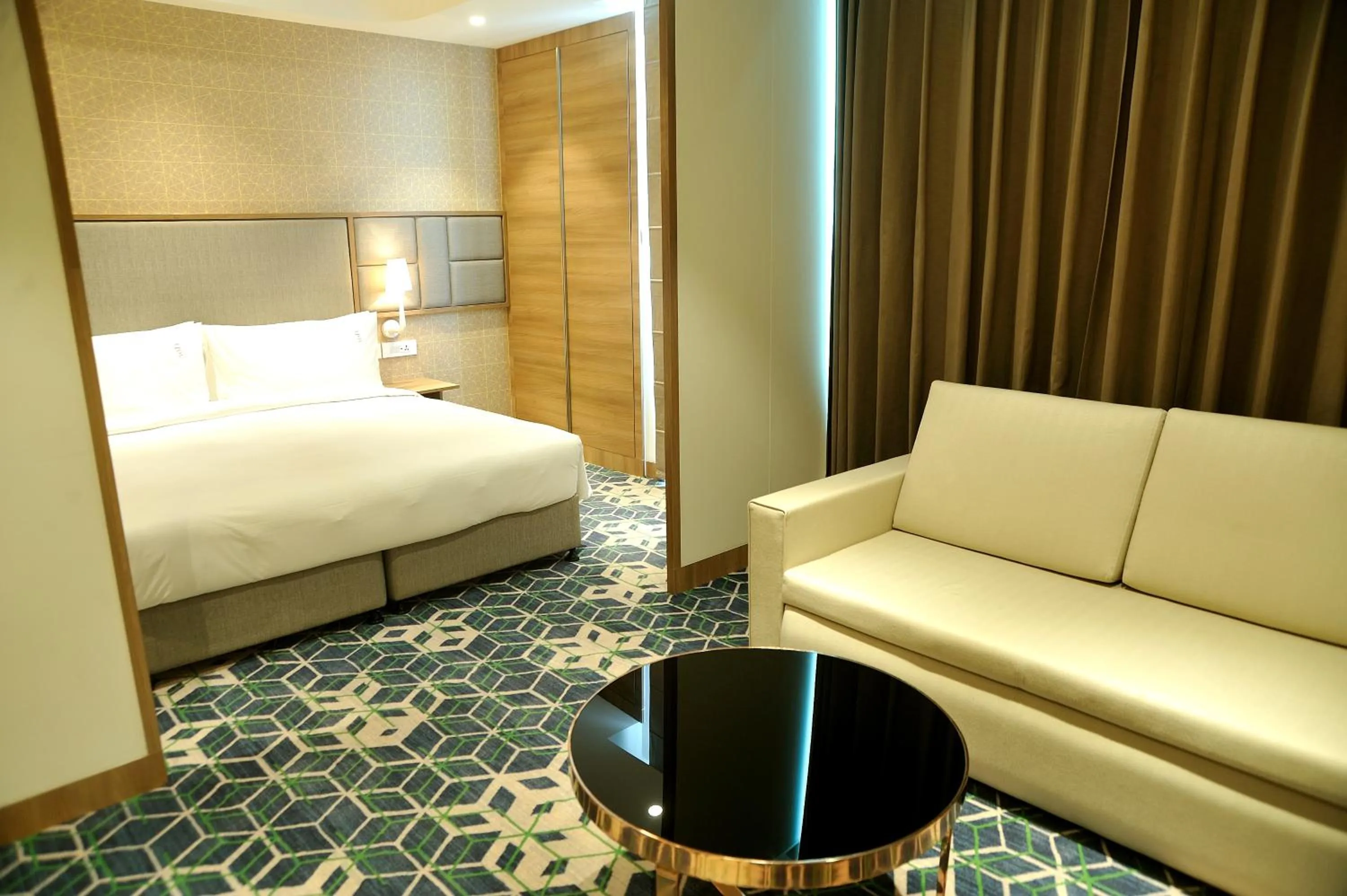 Bed in Holiday Inn Gurugram Sector 90 by IHG