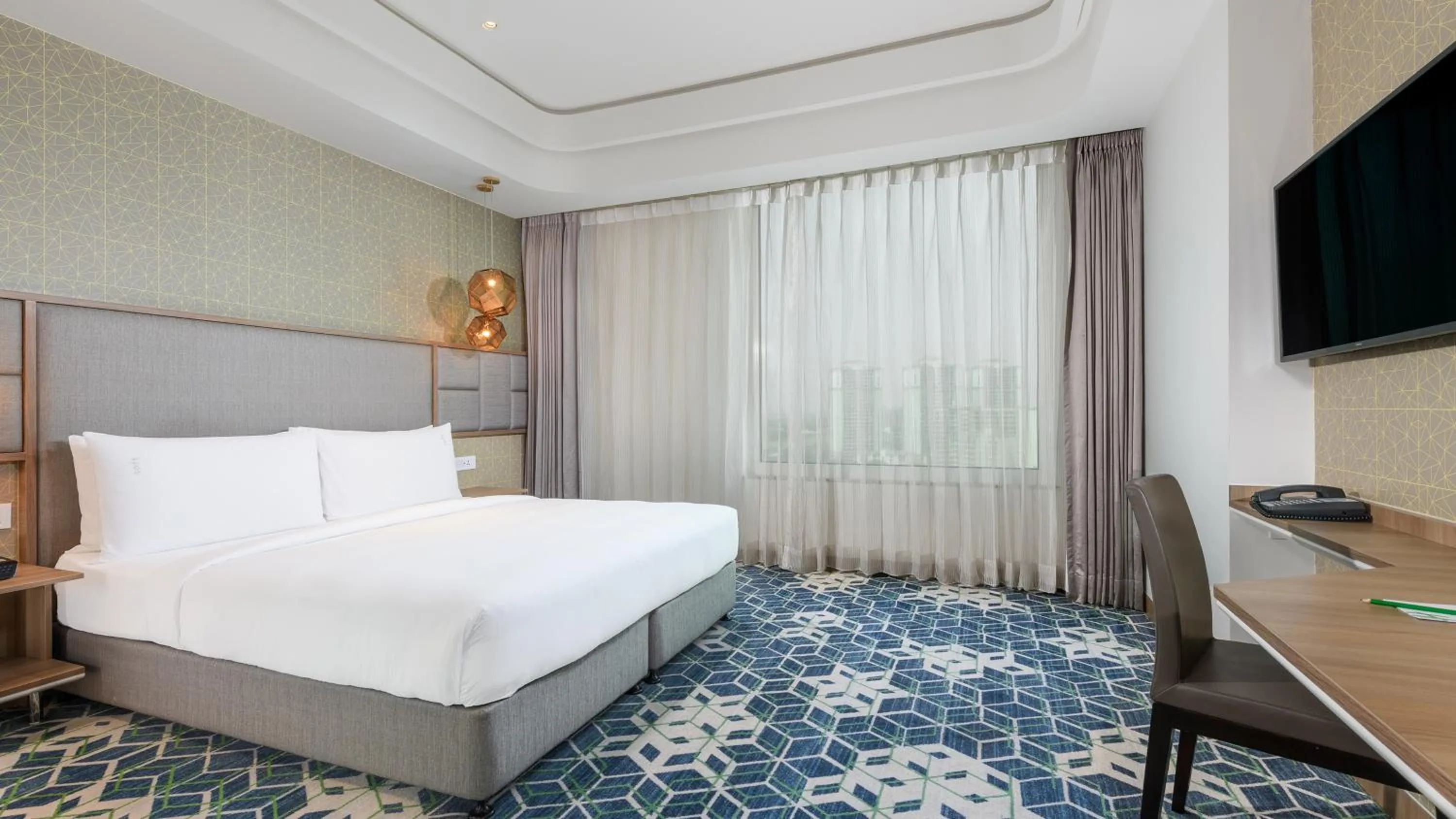 Bed in Holiday Inn Gurugram Sector 90 by IHG