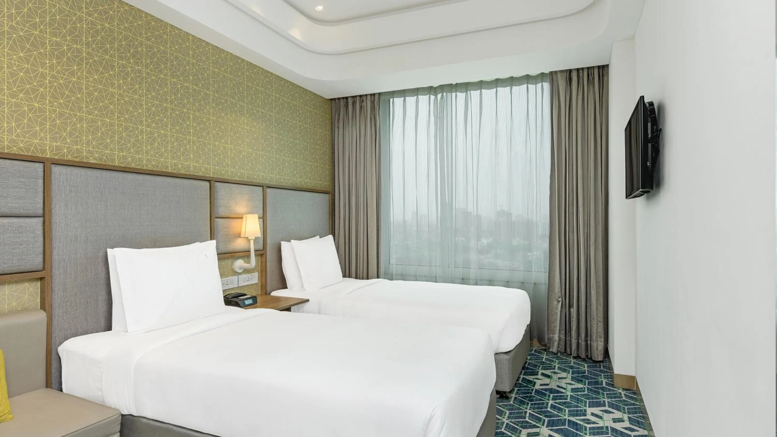 Bed in Holiday Inn Gurugram Sector 90 by IHG