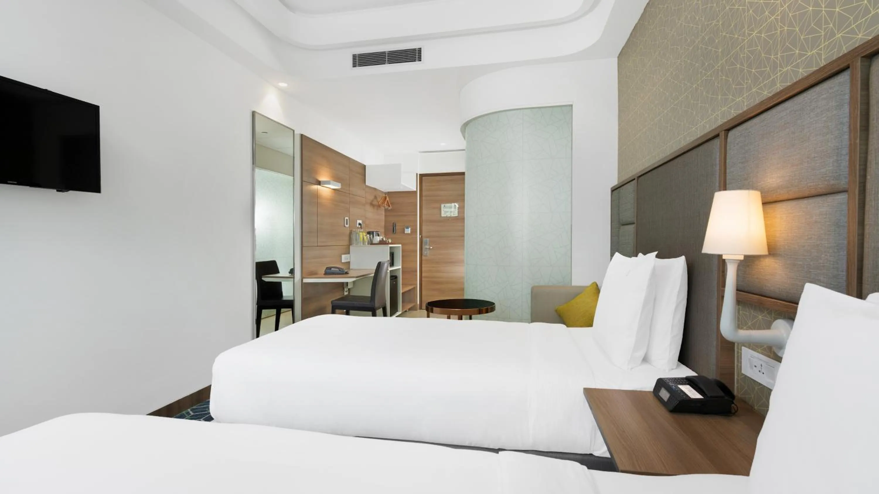 Bed in Holiday Inn Gurugram Sector 90 by IHG