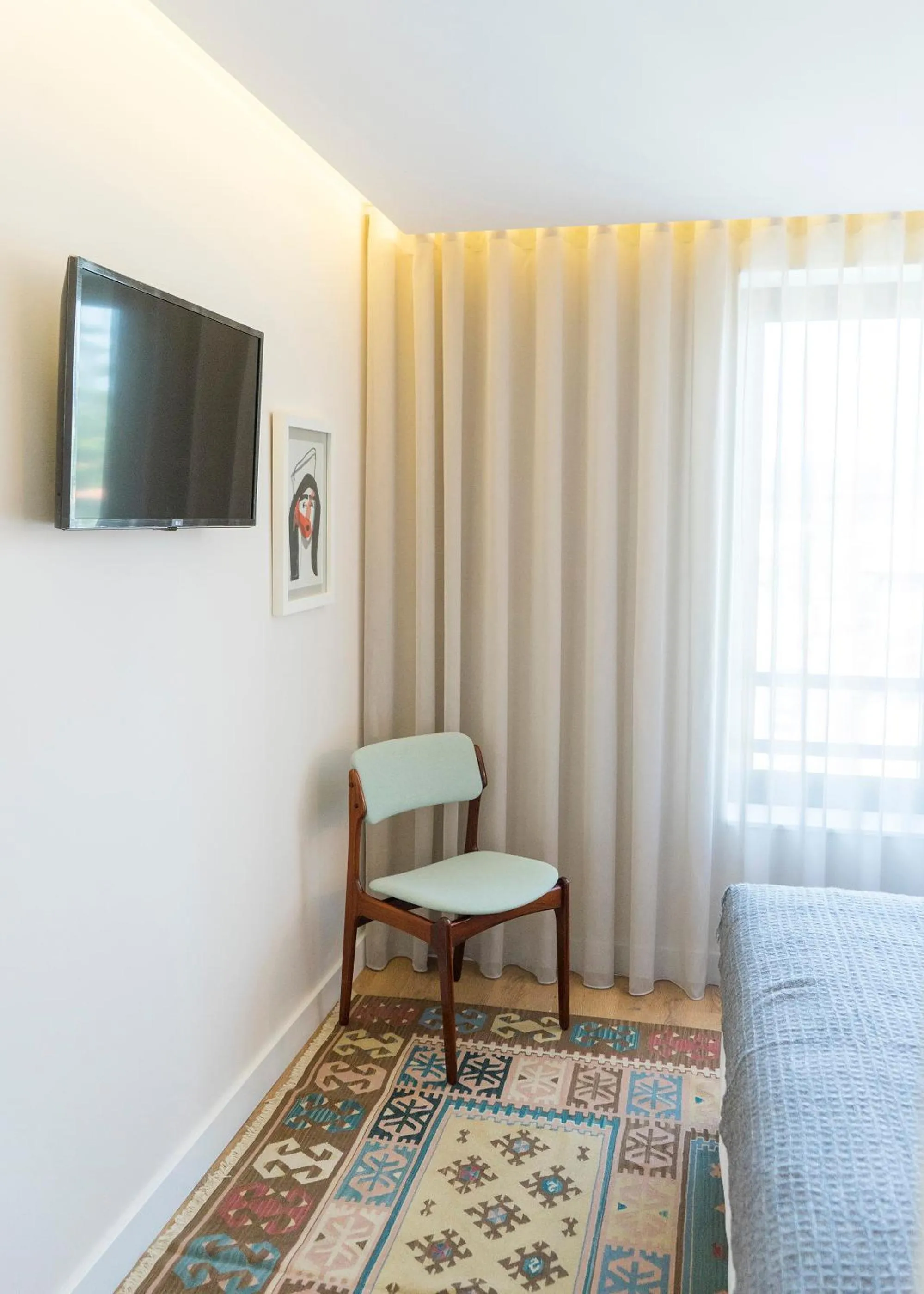 TV and multimedia in Casa da Ana Boutique Guest House