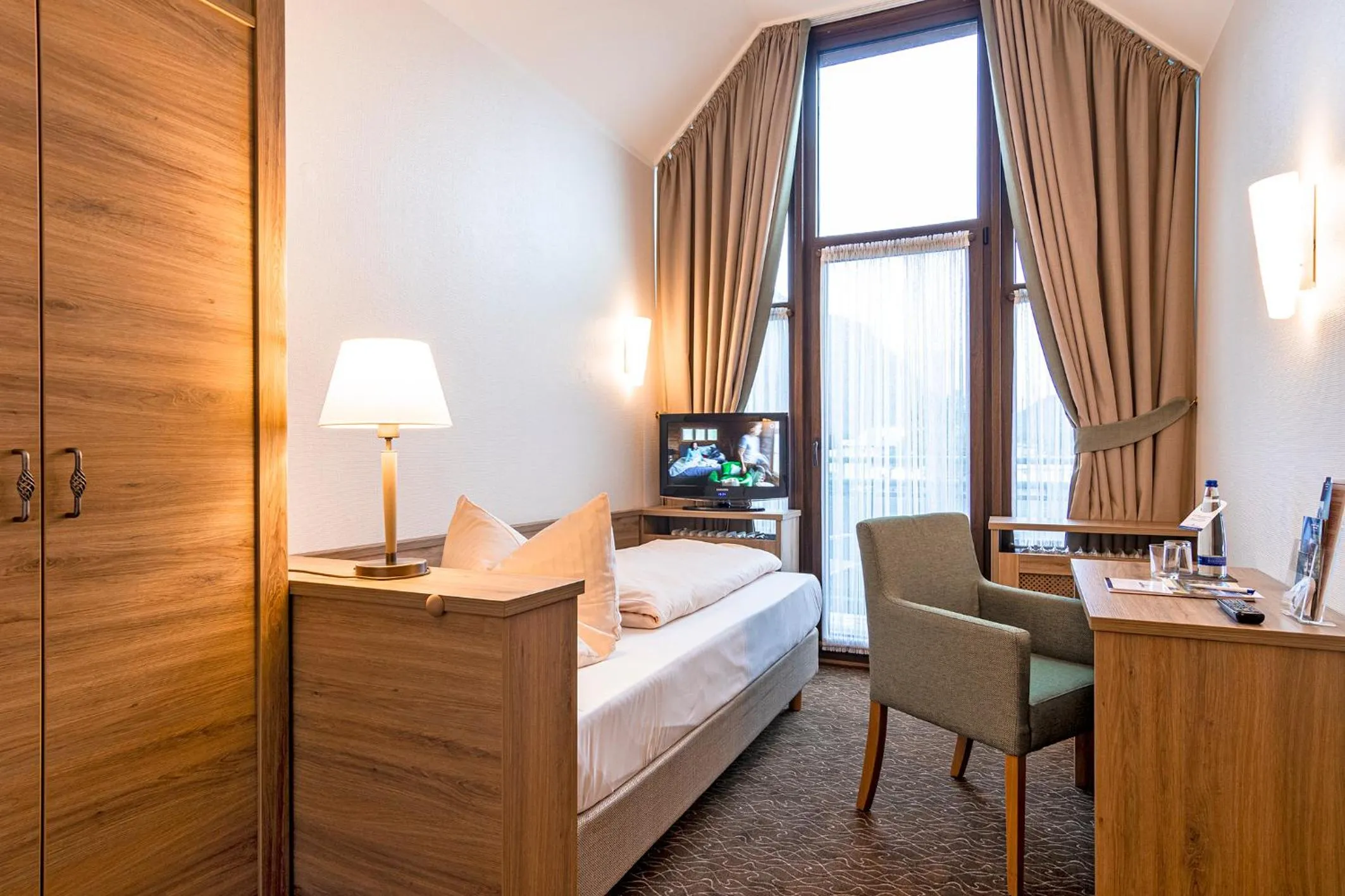 Bedroom, Bed in AMBER HOTEL Bavaria Superior