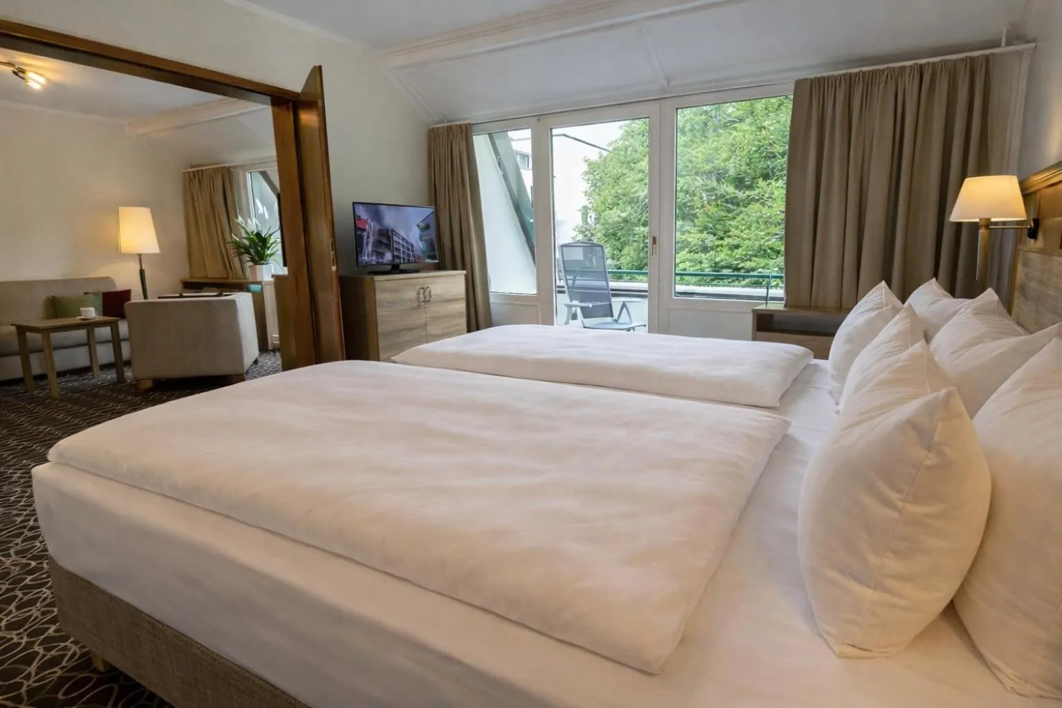 Bedroom, Bed in AMBER HOTEL Bavaria Superior