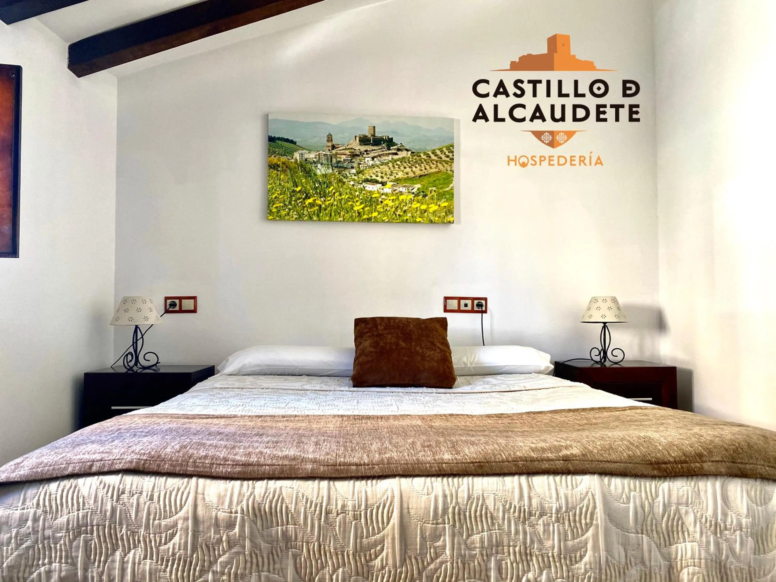 Bed in HOSPEDERÍA CASTILLO DE ALCAUDETE