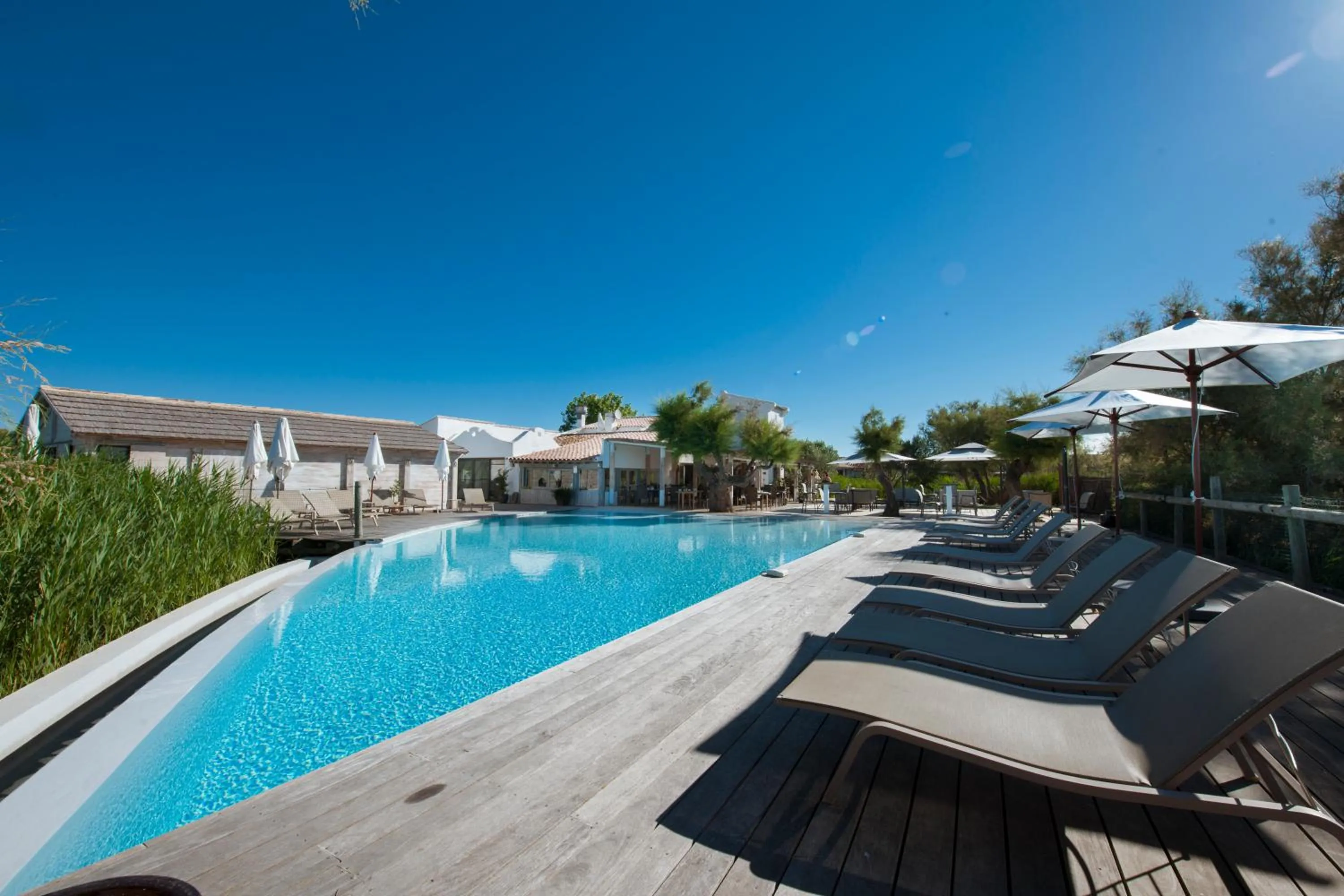 Swimming pool in Hôtel Restaurant Les Arnelles