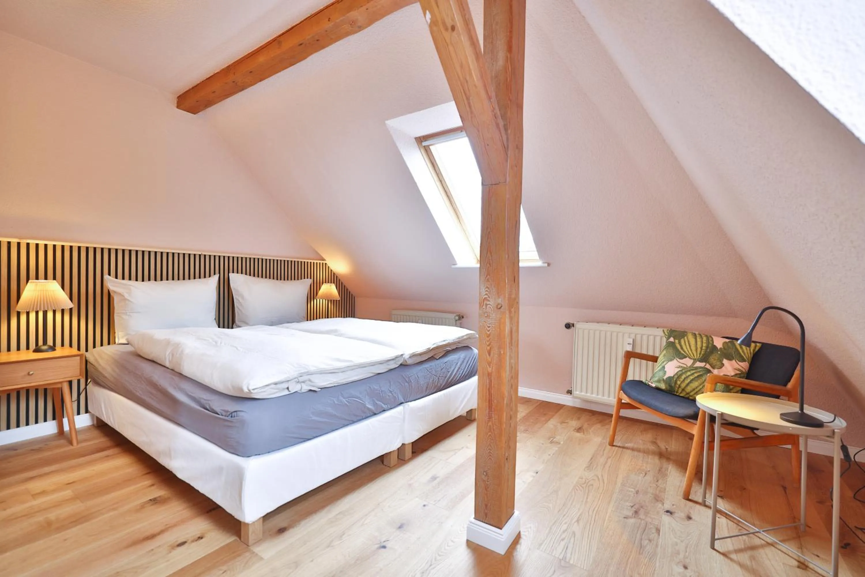 Bedroom, Bed in Ferienwohnung an der Brunnenaue