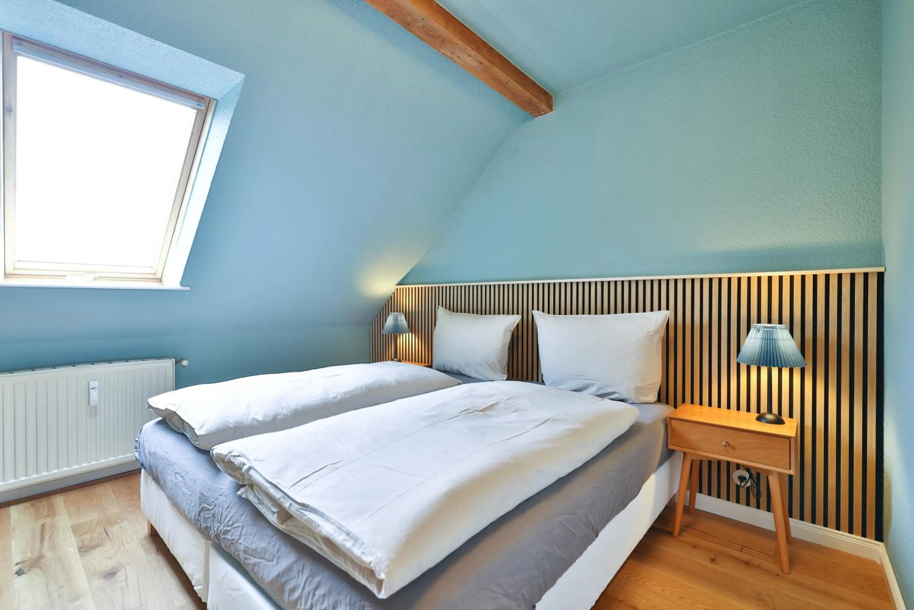 Bedroom, Bed in Ferienwohnung an der Brunnenaue