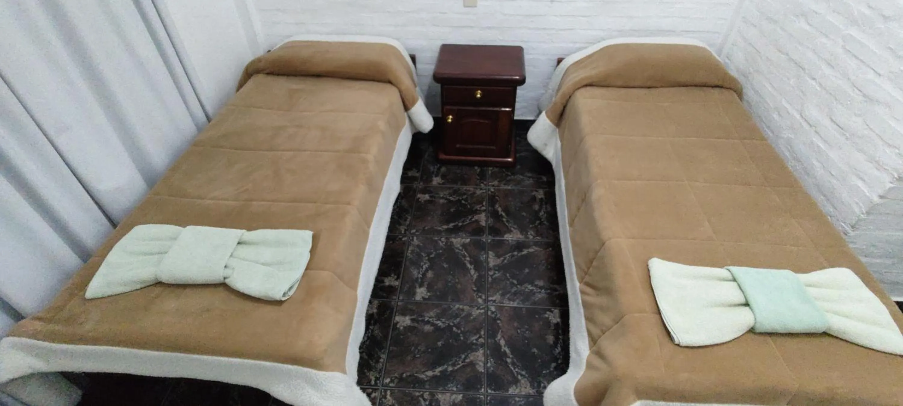 Bed in Hosteria Los Cuartos