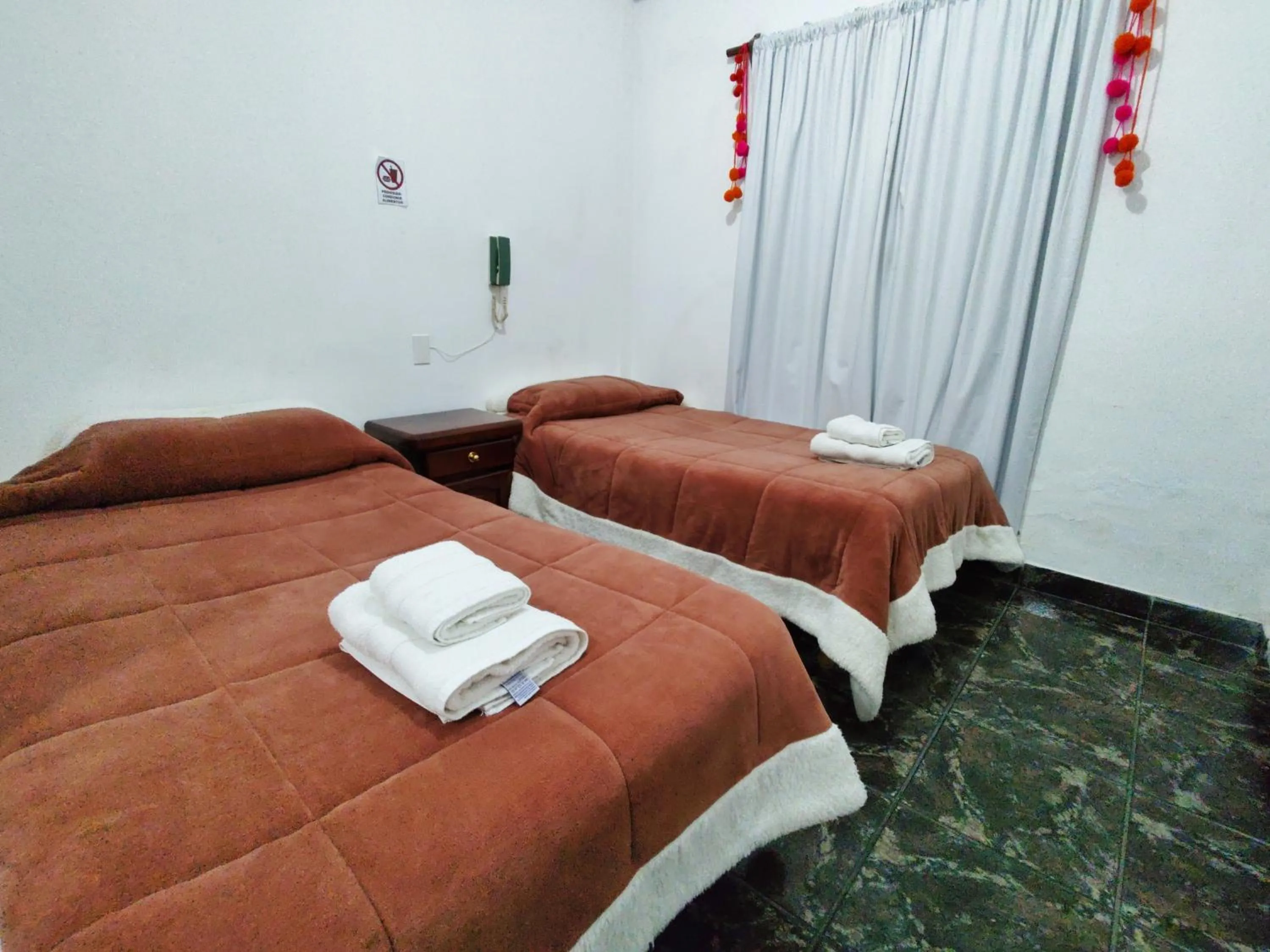 Bed in Hosteria Los Cuartos