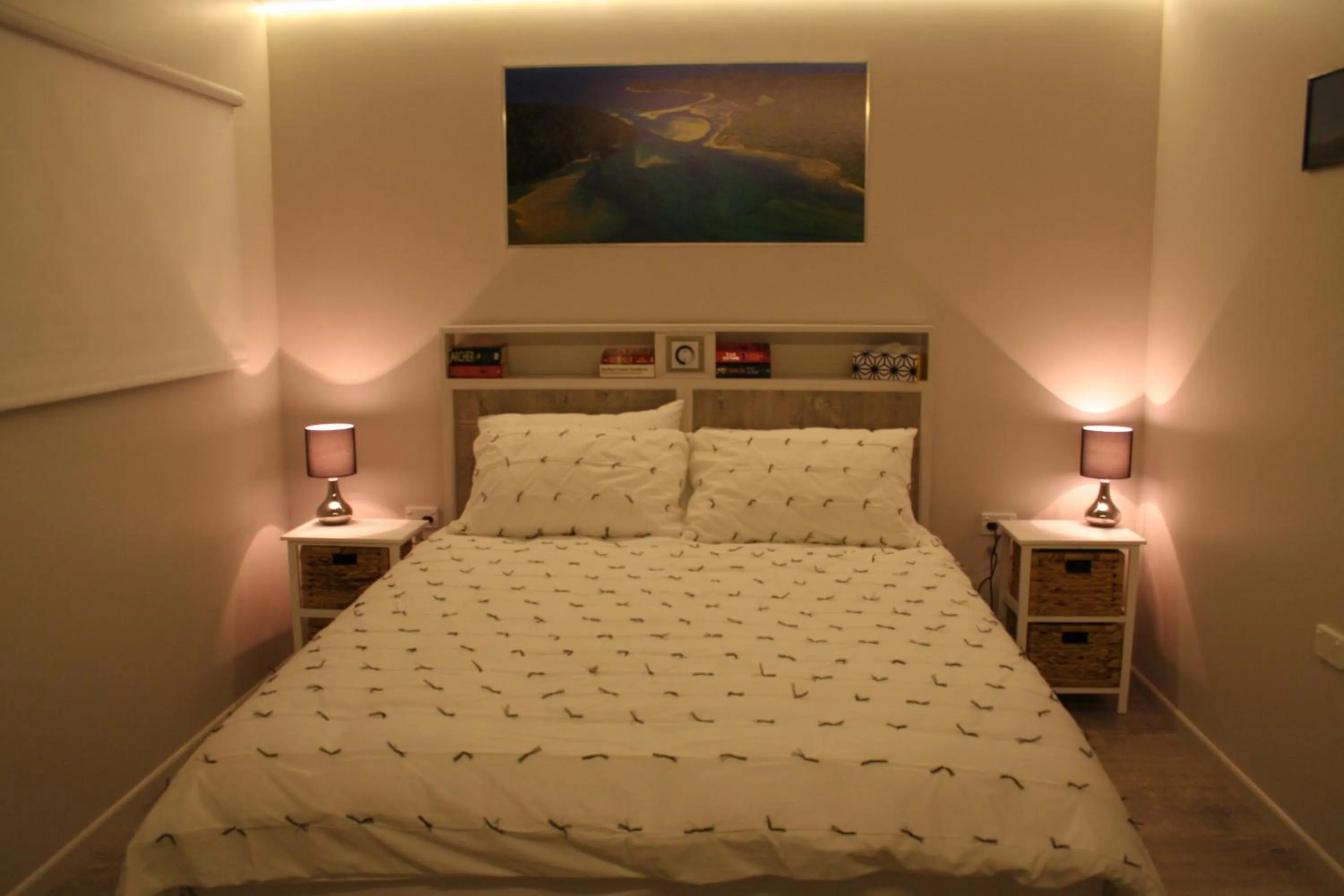 Bed in AHAVA Bed & Breakfast